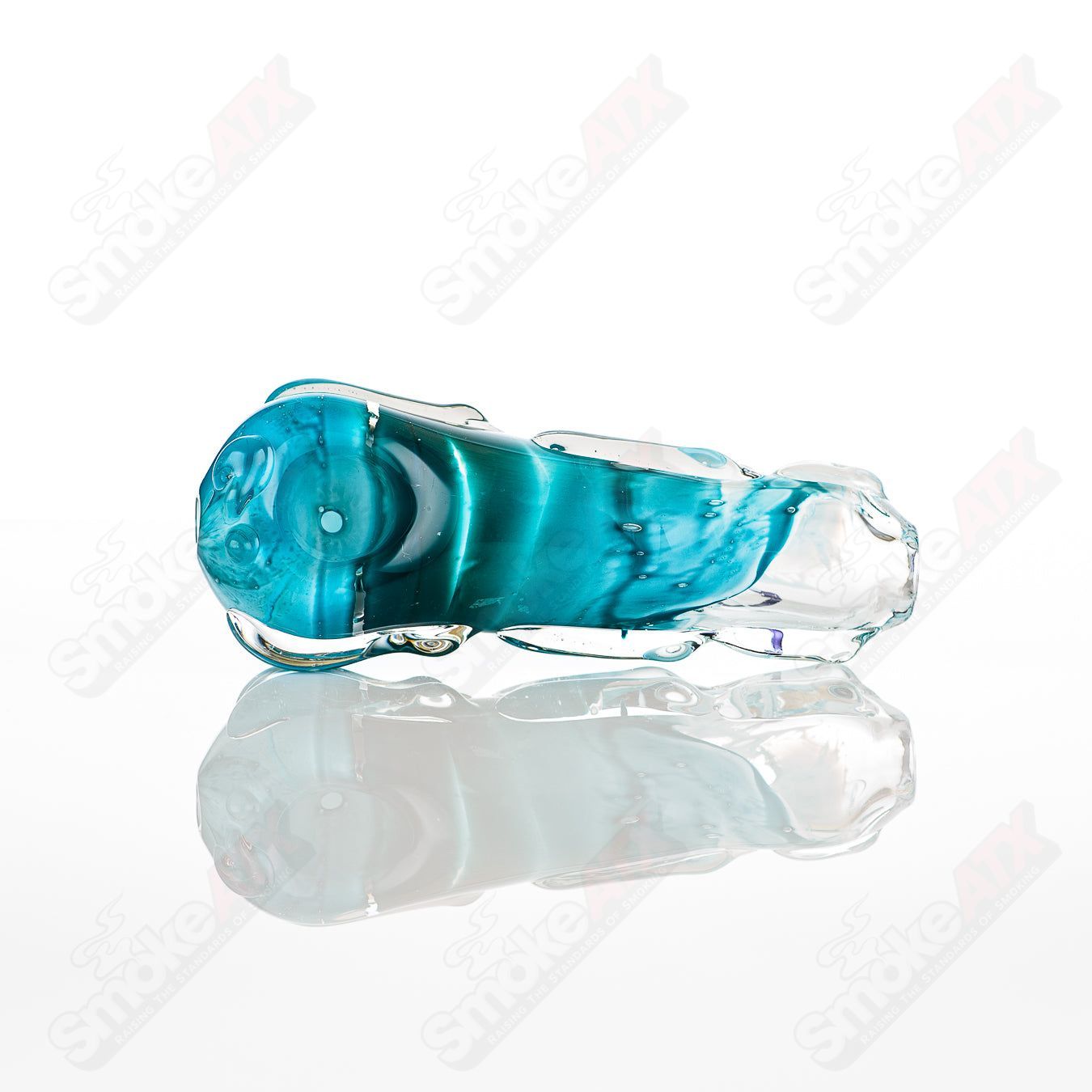 Glass pipe called Spoon Glass by Nobody featuring a clear, rounded bowl and sleek design for smoking or display purposes.