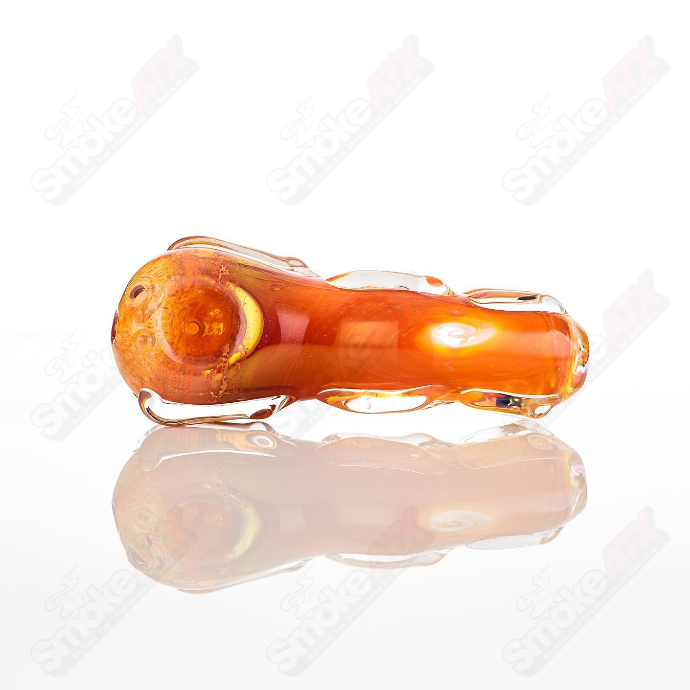 Glass pipe called Spoon Glass by Nobody, featuring a clear glass design with a rounded bowl and smooth mouthpiece.
