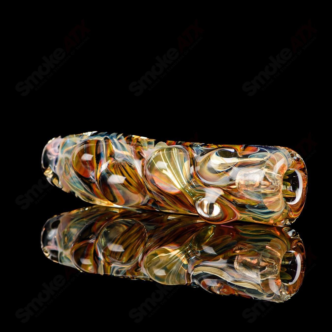 Texas Hot Glass Taster #34 Chillum glass pipe with clear glass design and compact shape for easy handling.
