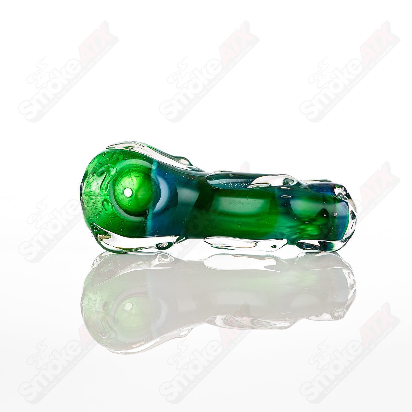 Glass pipe, #35 Spoon Glass by Nobody, featuring a clear glass design with a rounded bowl and smooth mouthpiece.