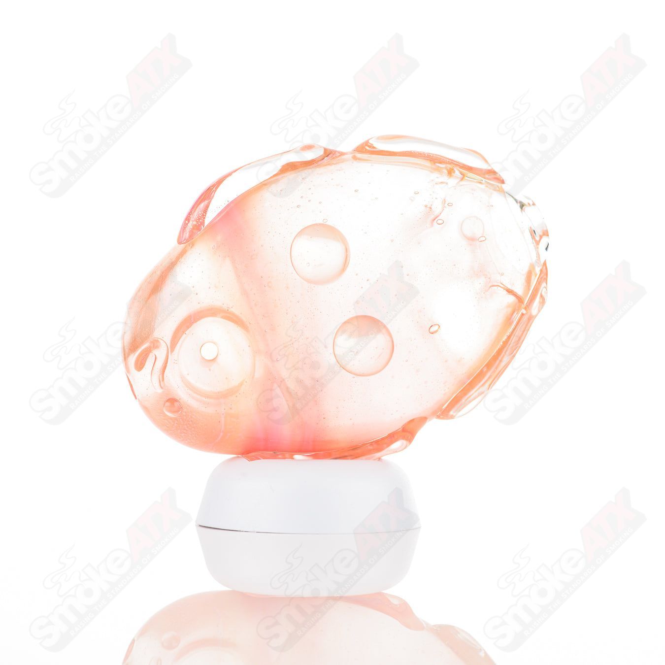 Glass pipe featuring a goddess design by Nobody, with intricate glasswork and a smooth, rounded shape for easy handling.