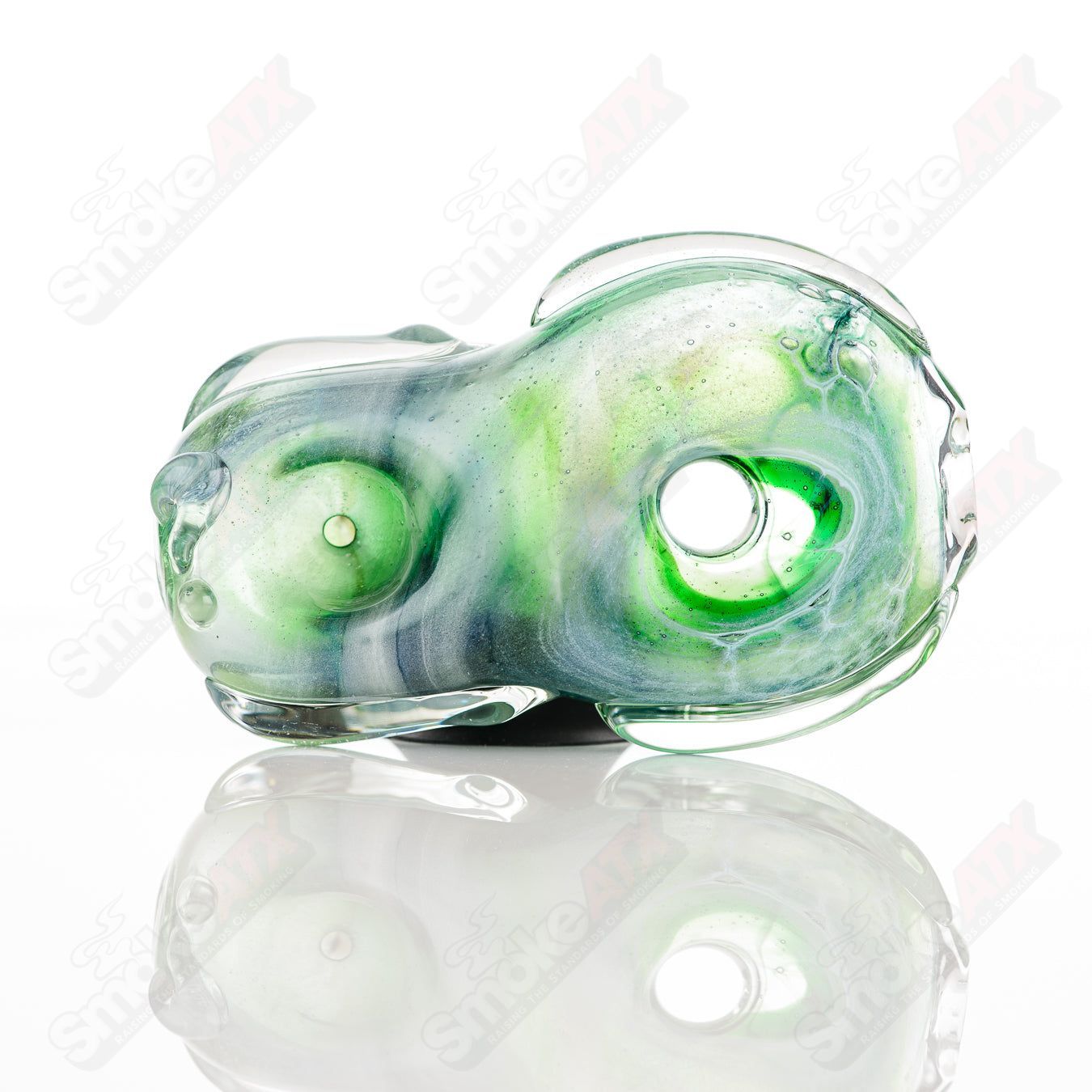 Glass by Nobody donut chillum pipe, clear glass with colorful decorative accents, designed for smoking enjoyment.