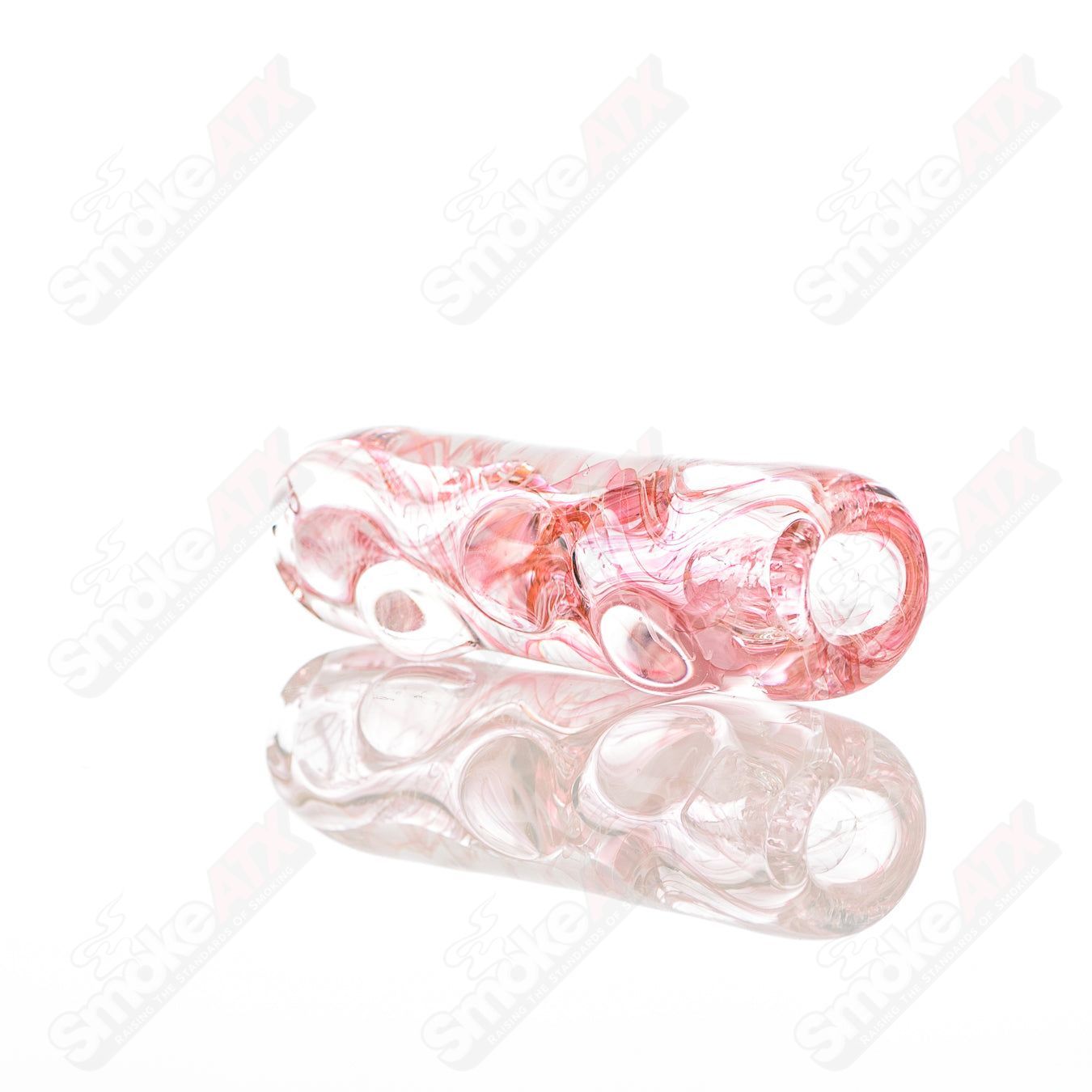 Texas Hot Glass Taster #38 Chillum glass pipe, compact smoking device with clear glass construction and detailed design.