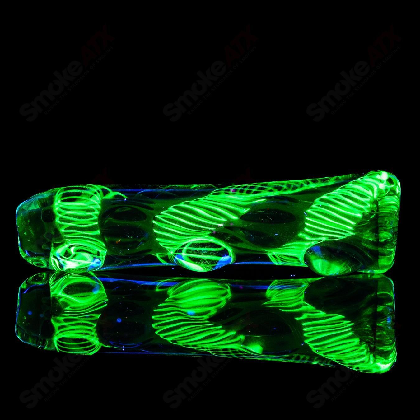 Texas Hot Glass 39 Taster Texas Hot Glass chillum glass pipe, clear with colorful accents, designed for smoking enjoyment.