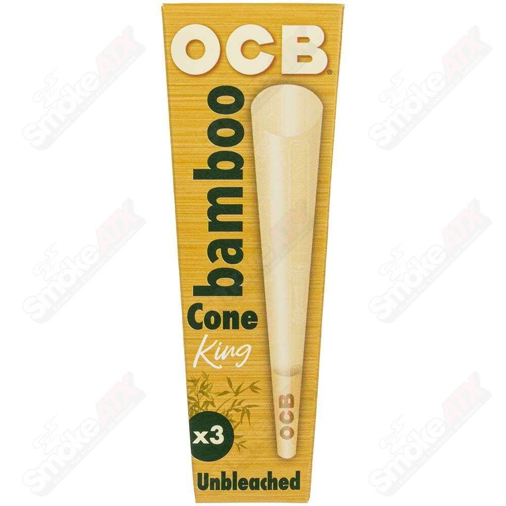 Three packs of OCB King Bamboo Cones for rolling, featuring natural bamboo material and classic cone design.