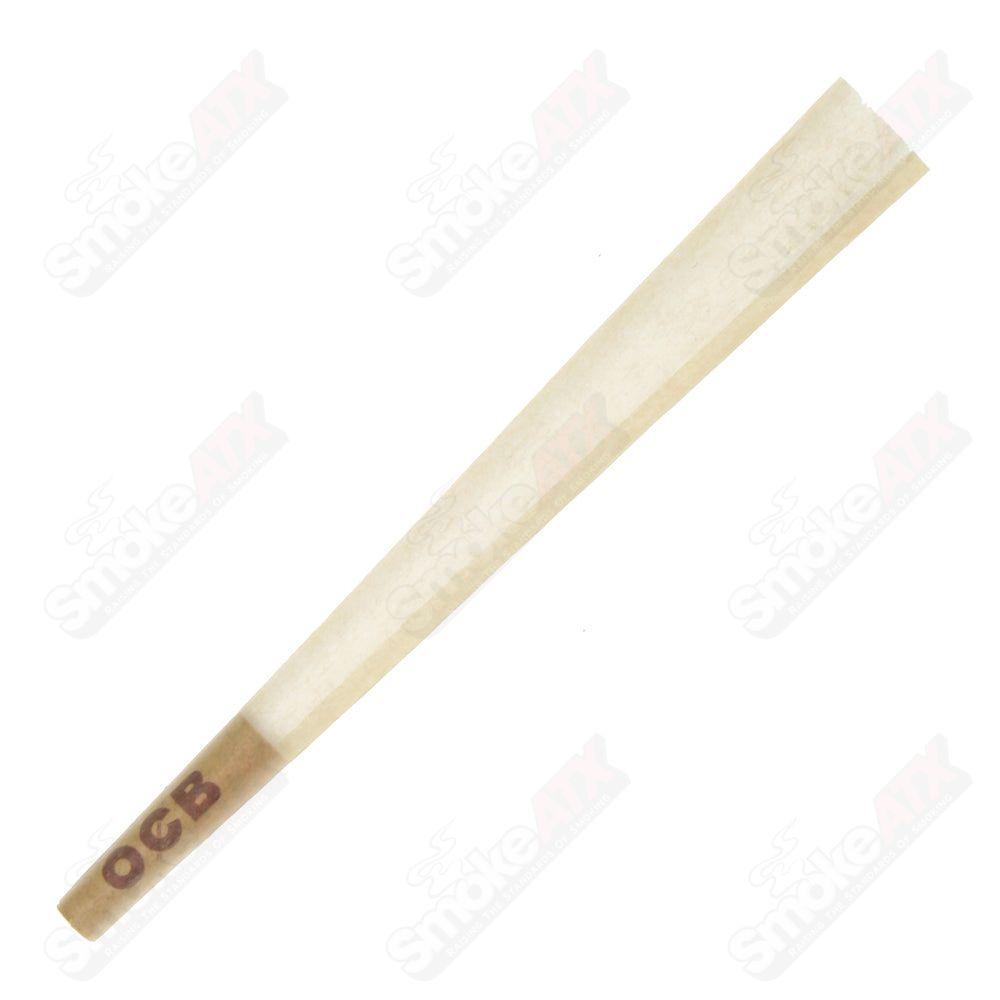 Three packs of King Unbleached Cones by OCB, natural rolling cones for smoking, displayed side by side.