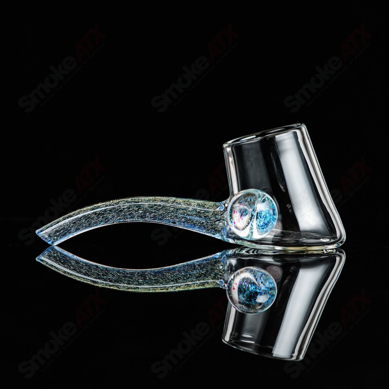 Justin Freeman glass Dichro Proxy Attachment, a colorful glass accessory with dichroic effects, designed for jewelry or art projects.