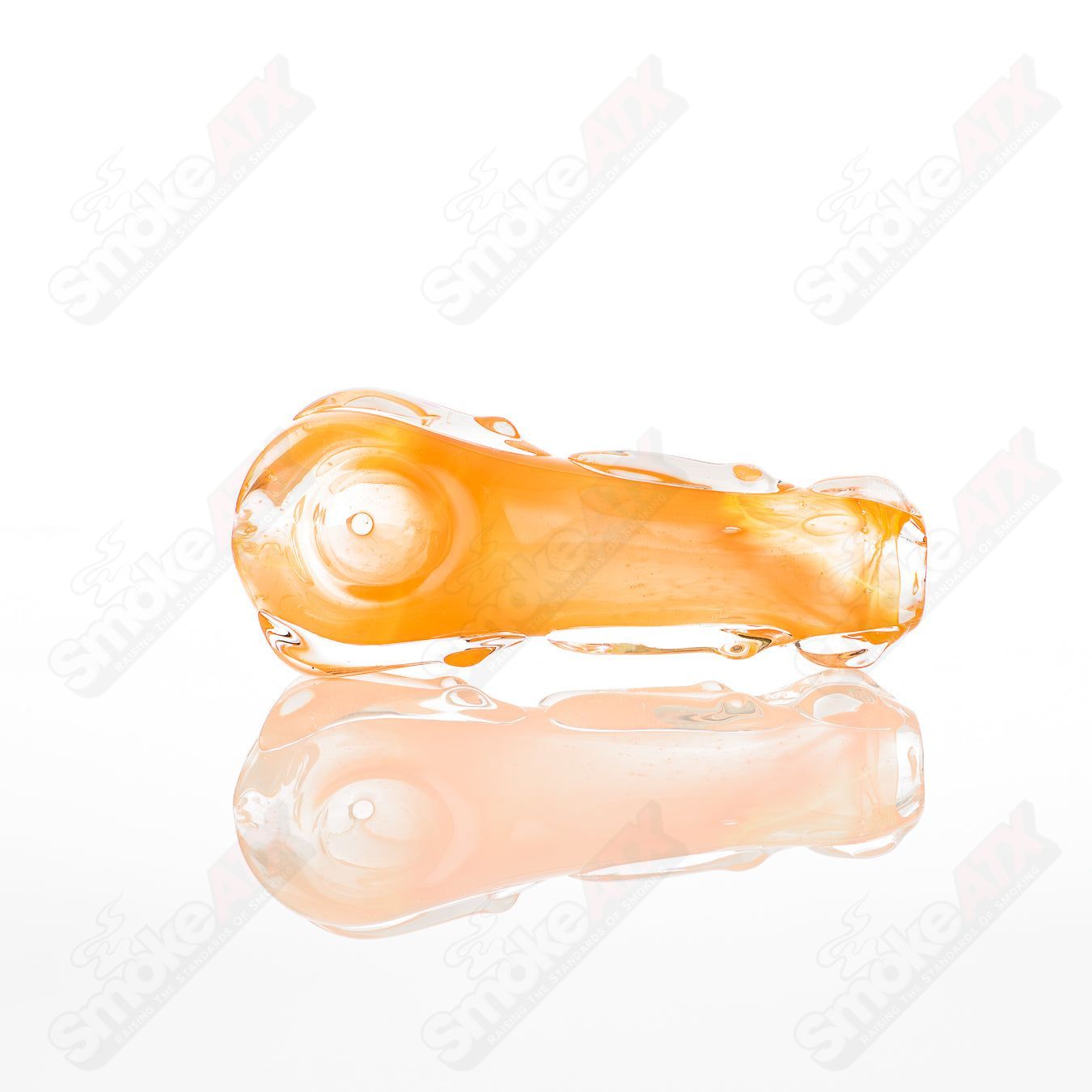 Glass pipe called Spoon Glass by Nobody featuring clear glass with a rounded bowl and slender stem design.