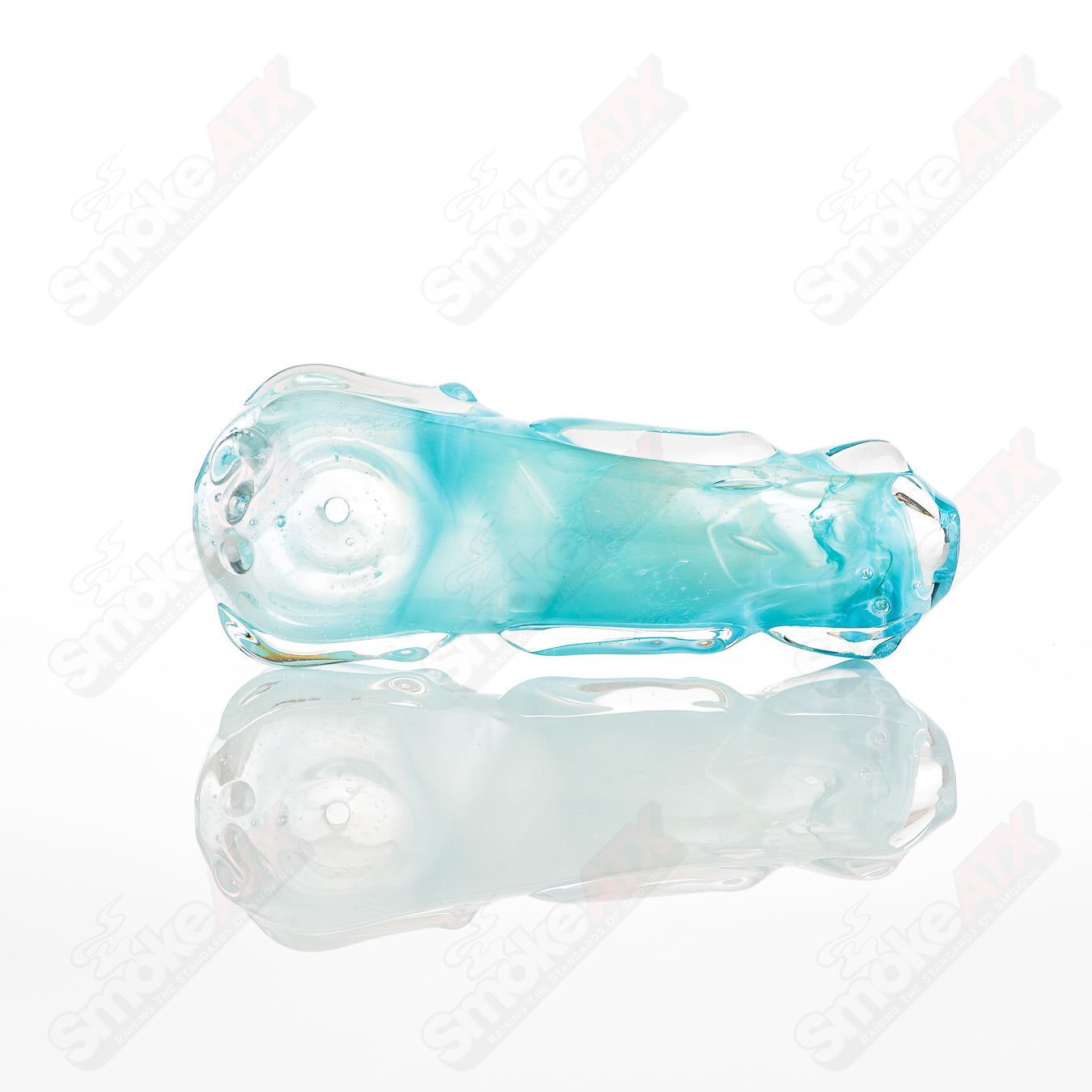 Clear glass spoon pipe by Nobody featuring a rounded bowl and smooth design, ideal for smoking.