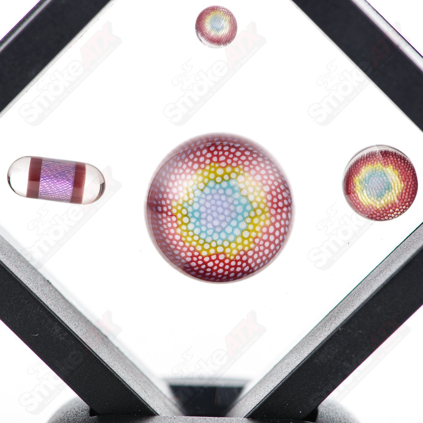 Set of four Dosa Glass Slurper Set by Smoke ATX, featuring colorful, heady glass design perfect for flavorful dabbing experiences.