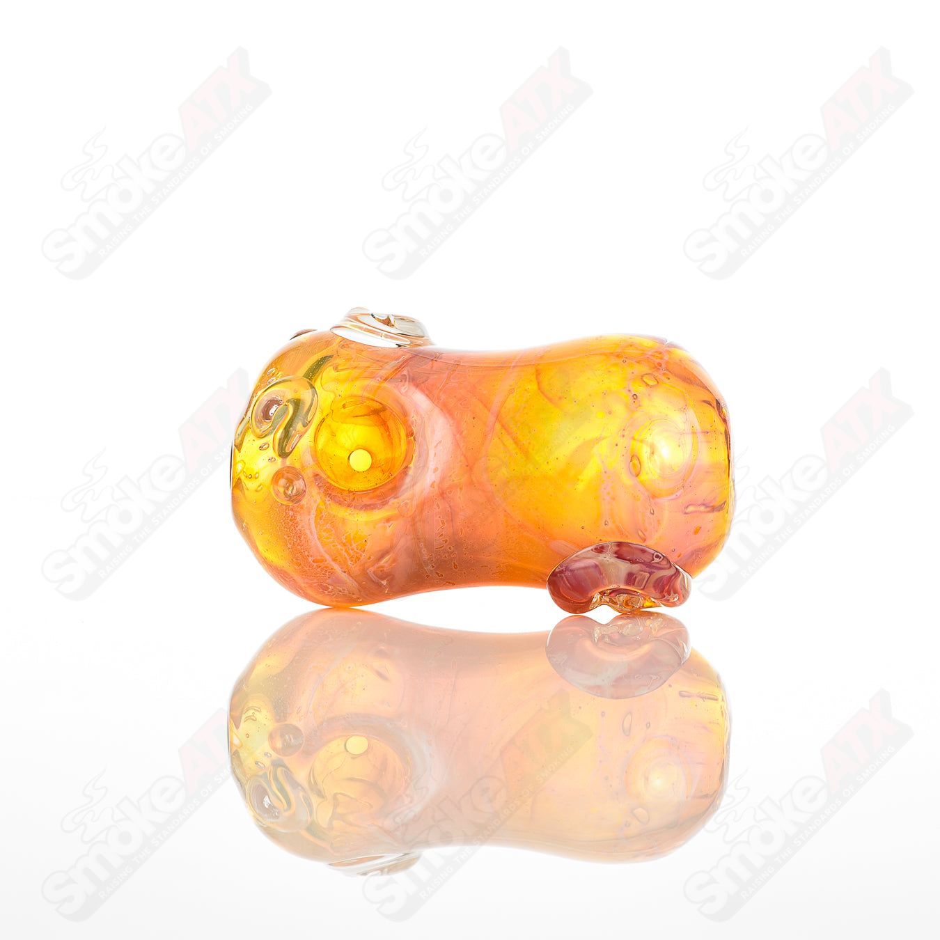 Clear glass #5 Bean Spoon pipe by Nobody featuring a smooth, rounded bean-shaped bowl and a straight stem design.