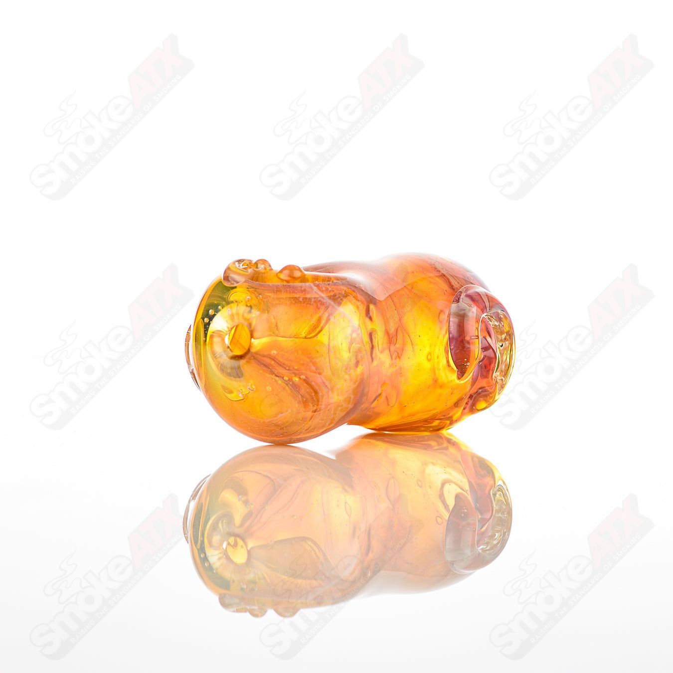 Glass pipe called #5 Bean Spoon by Nobody, clear glass with a bean-shaped bowl and smooth curved design.