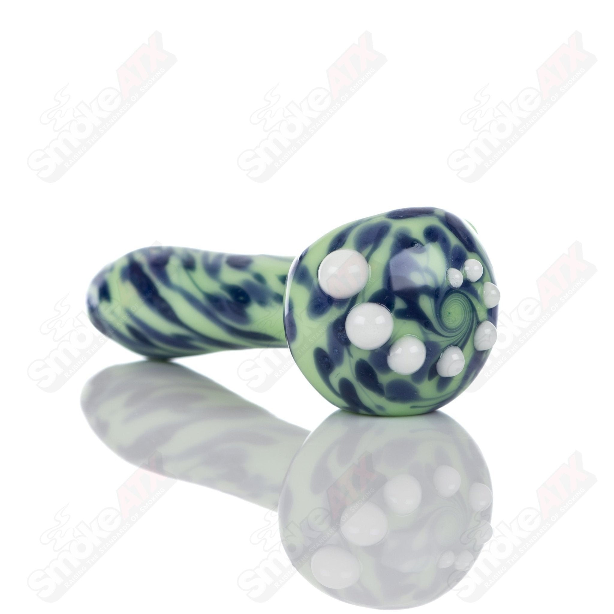 Colorful kiwi splatter glass spoon pipe by Adventures In Glass Blowing, showcasing intricate design and craftsmanship.