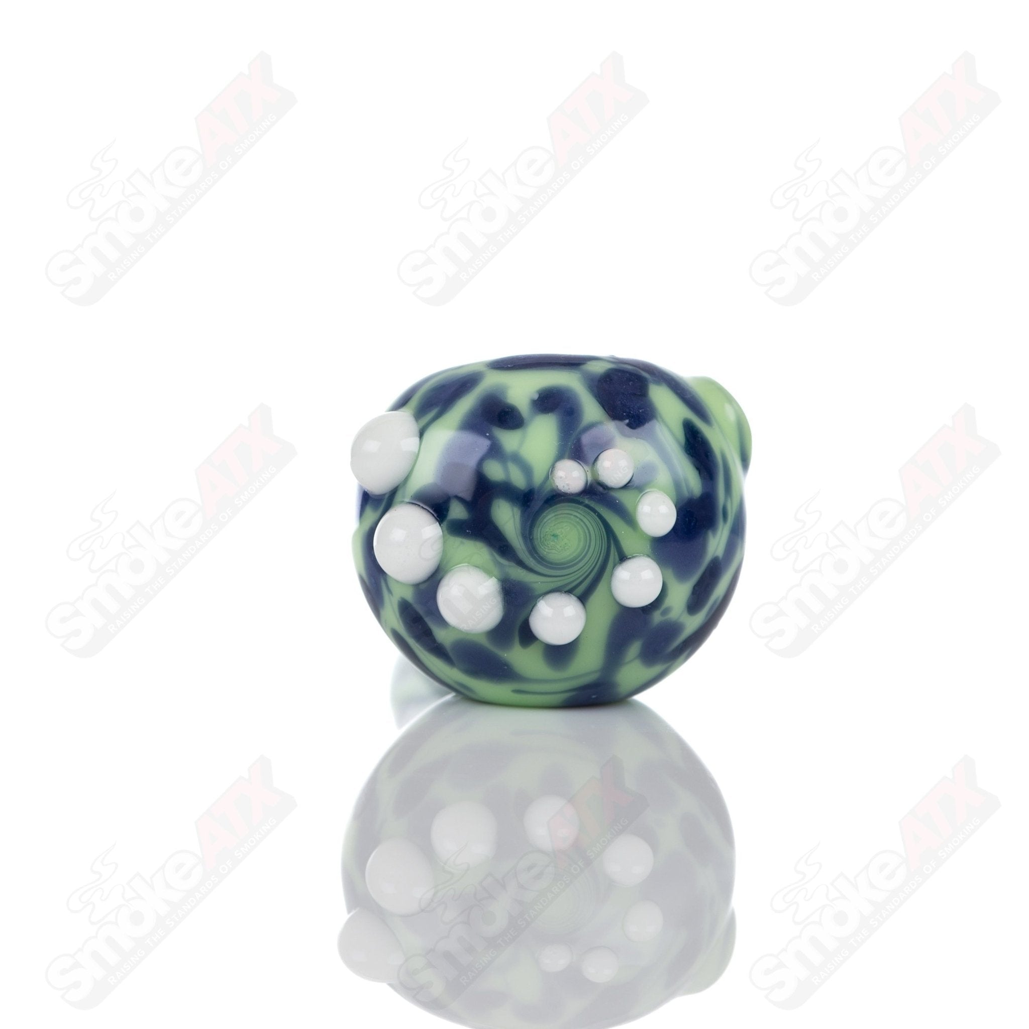 Colorful Kiwi splatter glass spoon pipe by Adventures In Glass Blowing, showcasing intricate glass blowing craftsmanship.