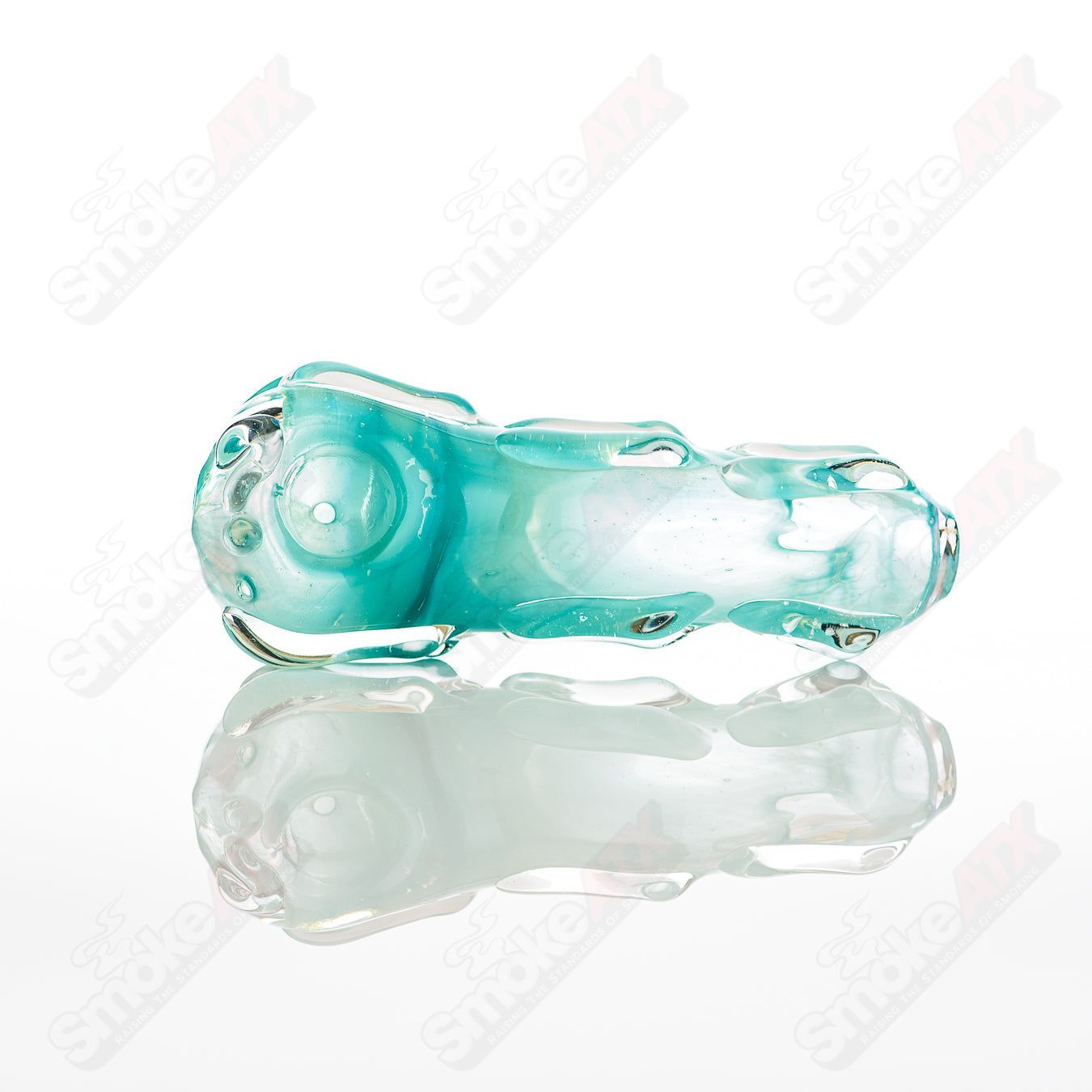 Glass by Nobody #53 Spoon Glass pipe with clear glass and smooth curved design, ideal for smoking use.