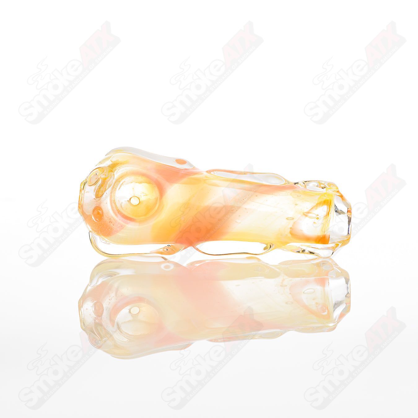 Clear glass spoon pipe by Nobody featuring a smooth, rounded bowl and a slender stem for smoking or herbal use.