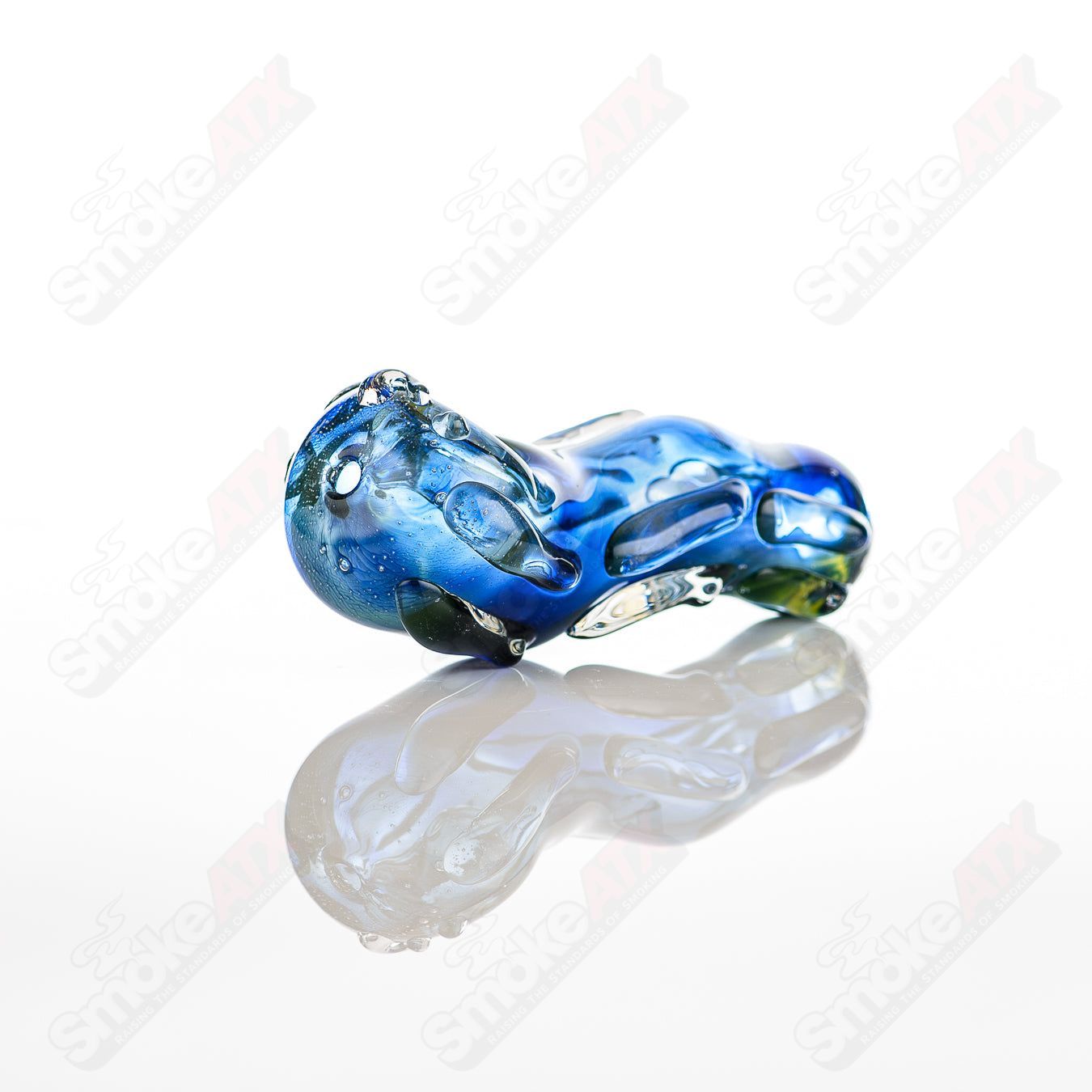 Glass pipe called #58 Spoon Glass by Nobody, clear glass with a rounded bowl and smooth stem for smoking.