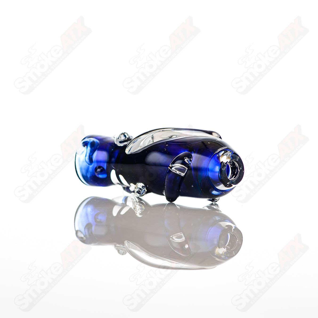 Large glass chillum by Nobody featuring clear glass design and compact shape, perfect for portable use.