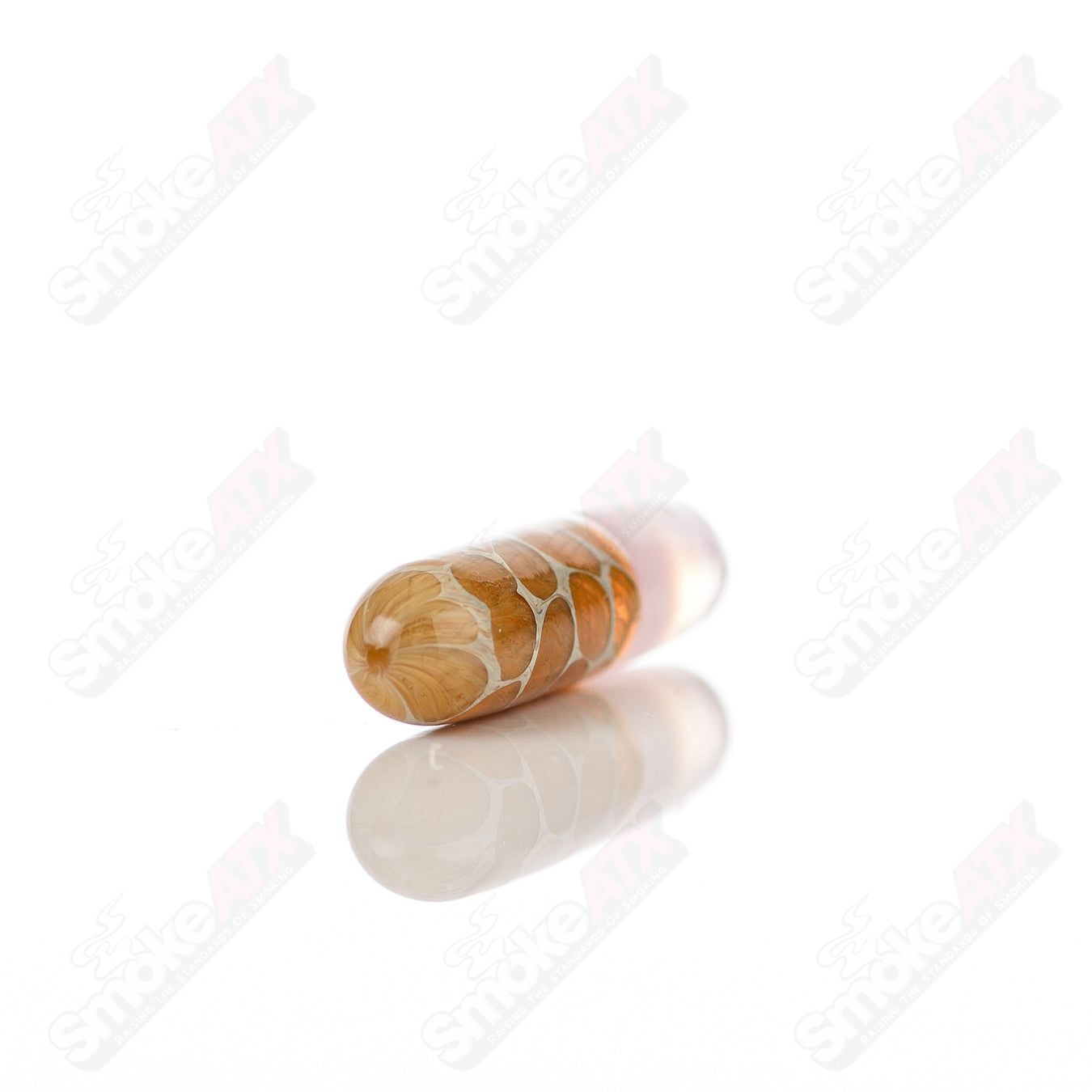 Robertson Glass 710 Products #6 Terp Pill made of glass, featuring a compact, cylindrical design with colorful accents.