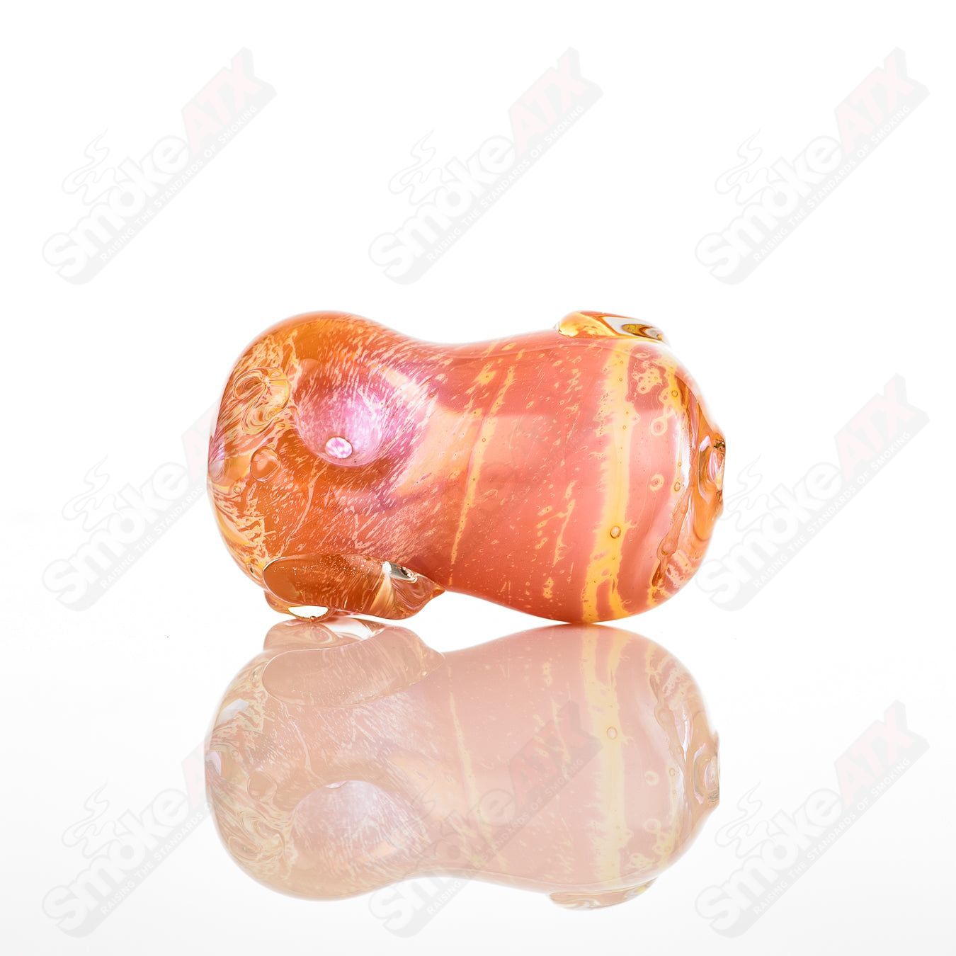 Glass pipe called #7 Bean Spoon by Nobody, clear glass with a bean-shaped bowl and smooth, rounded design for smoking.