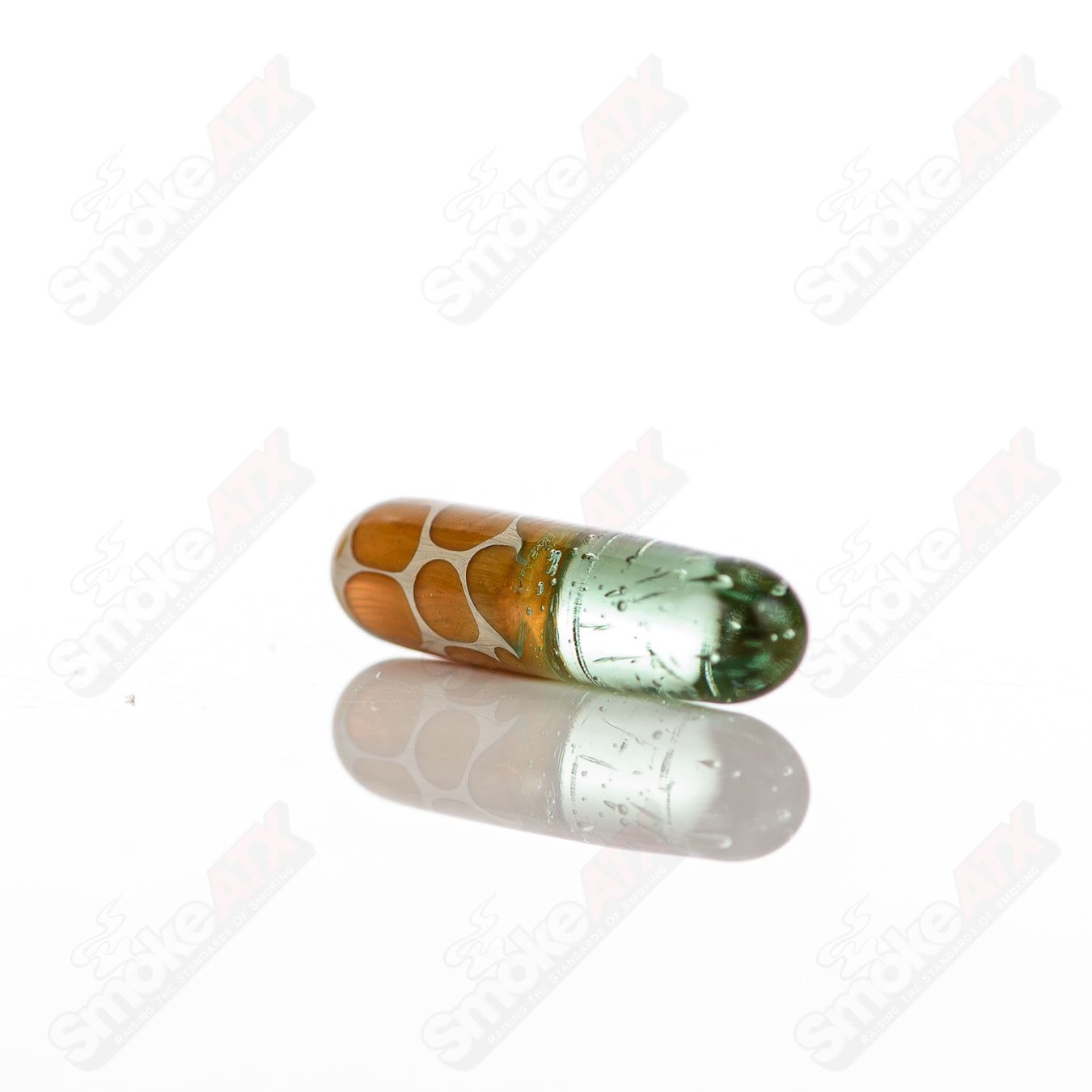 710 Products Robertson Glass #7 Terp Pill, a clear glass pipe with a distinctive terpene storage pill design.