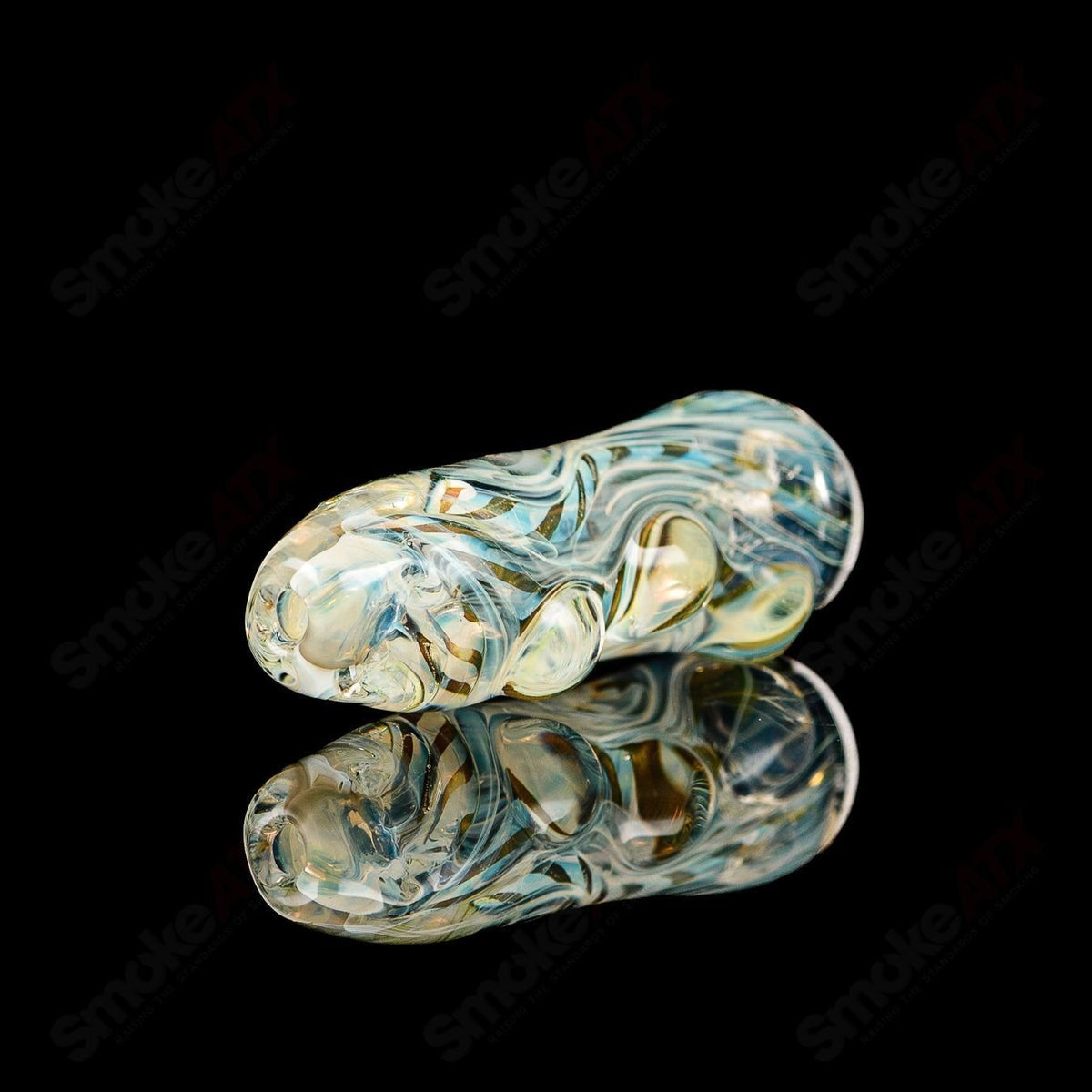 Clear glass chillum labeled "#8 Taster Texas Hot Glass," designed for smoking with a compact, portable style.
