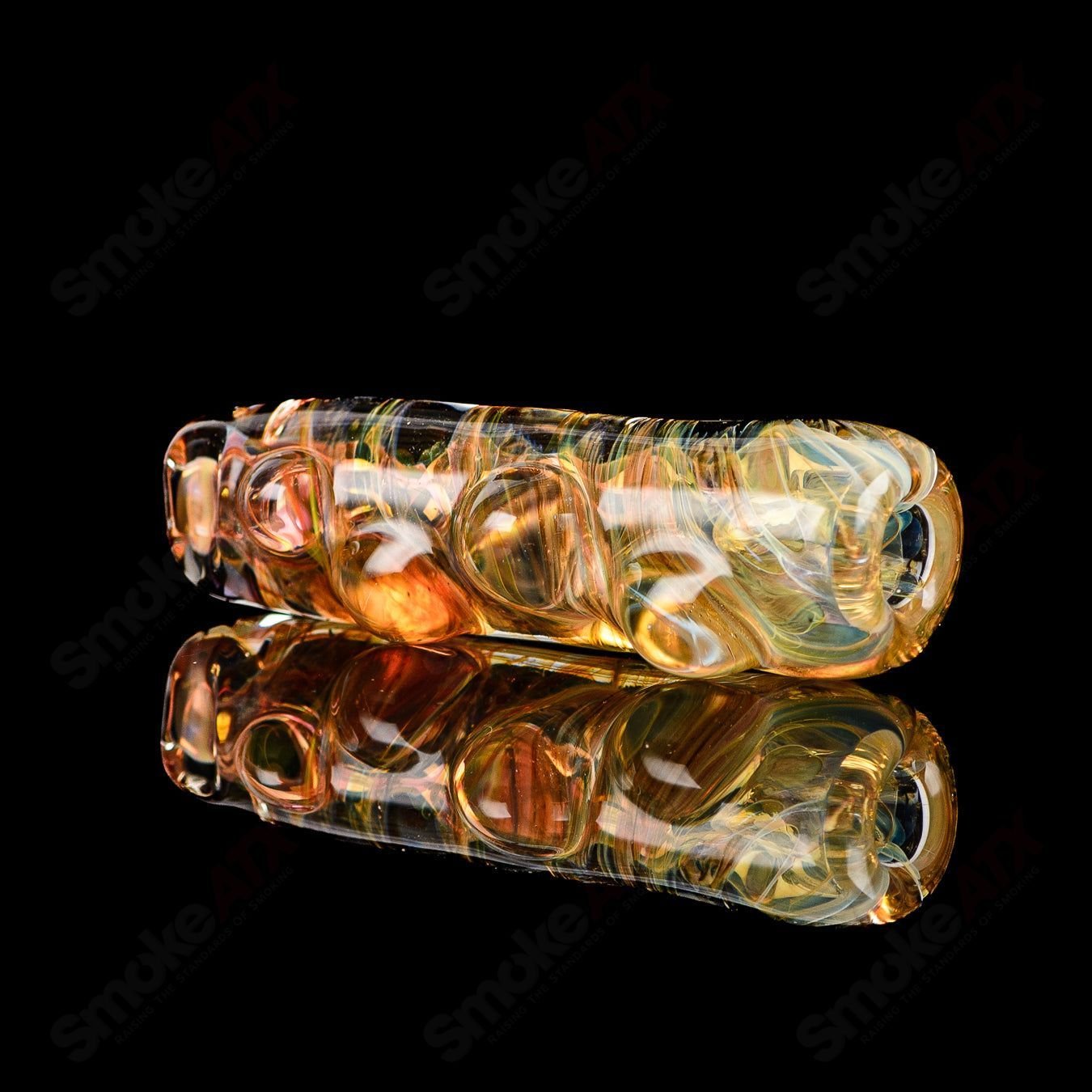 Texas Hot Glass #9 Taster Chillum, clear glass smoking pipe with a compact, ergonomic design for easy handling and use.