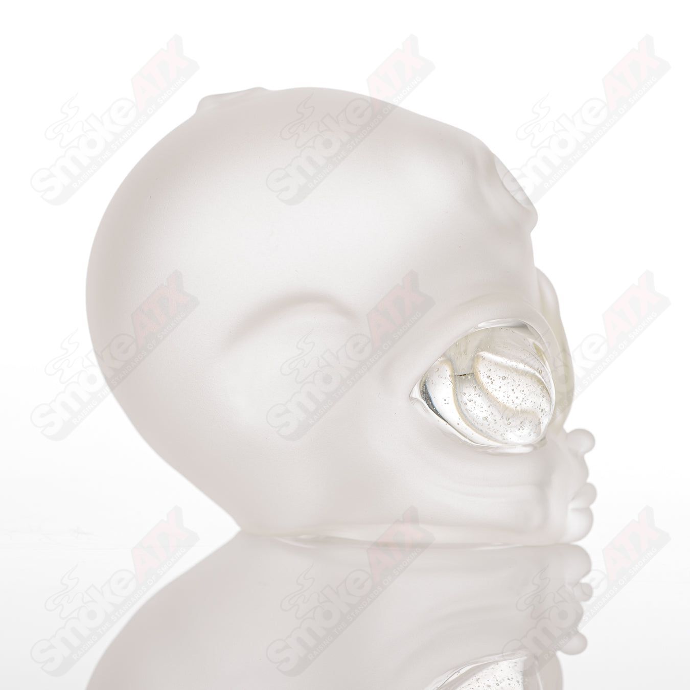 Alien Traveler Ghost Glass heady concentrate rig featuring a detailed alien design with vibrant colors and intricate glasswork.