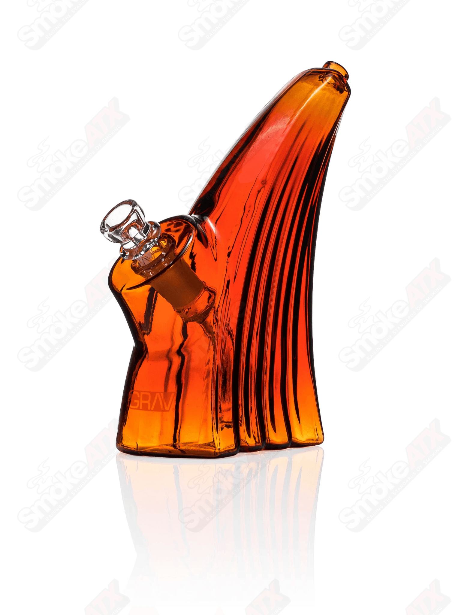 Amber Wave Grav glass waterpipe bubbler with swirling amber and clear design, featuring a compact, ergonomic shape for smooth hits.