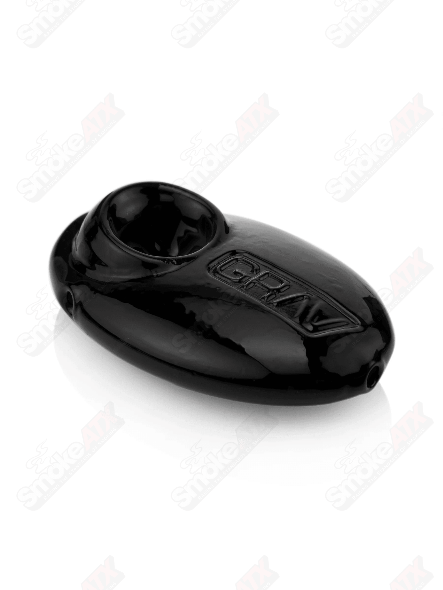 Black pebble glass spoon pipe by Grav Labs, featuring a smooth, rounded design ideal for smoking sessions.