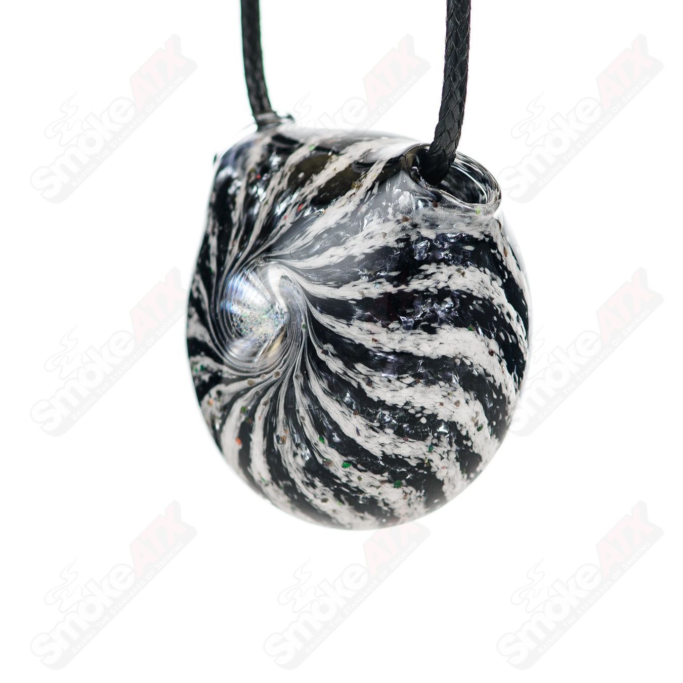 Black and white dichro glass pendant by Merican Made, featuring vibrant color shift and unique handcrafted design.