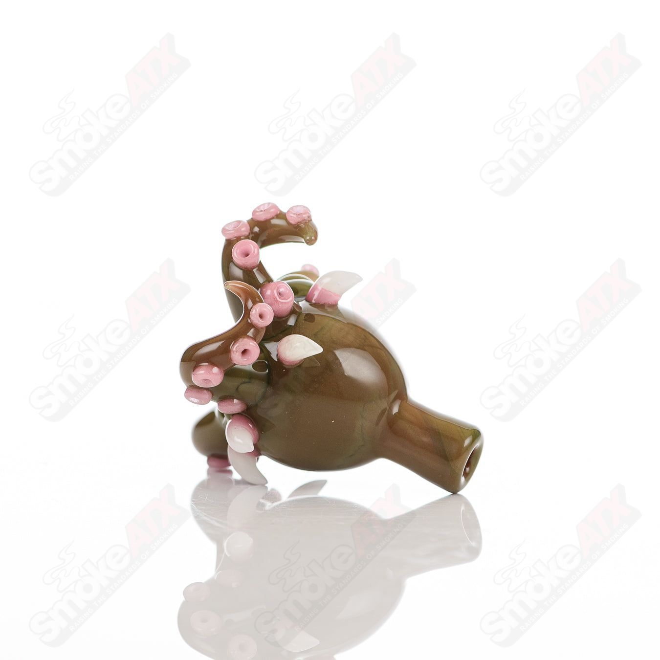 Glass bubble cap for dabbing, Spanish Olive design by Salt Glass, used for controlling airflow in heady glass carb caps.