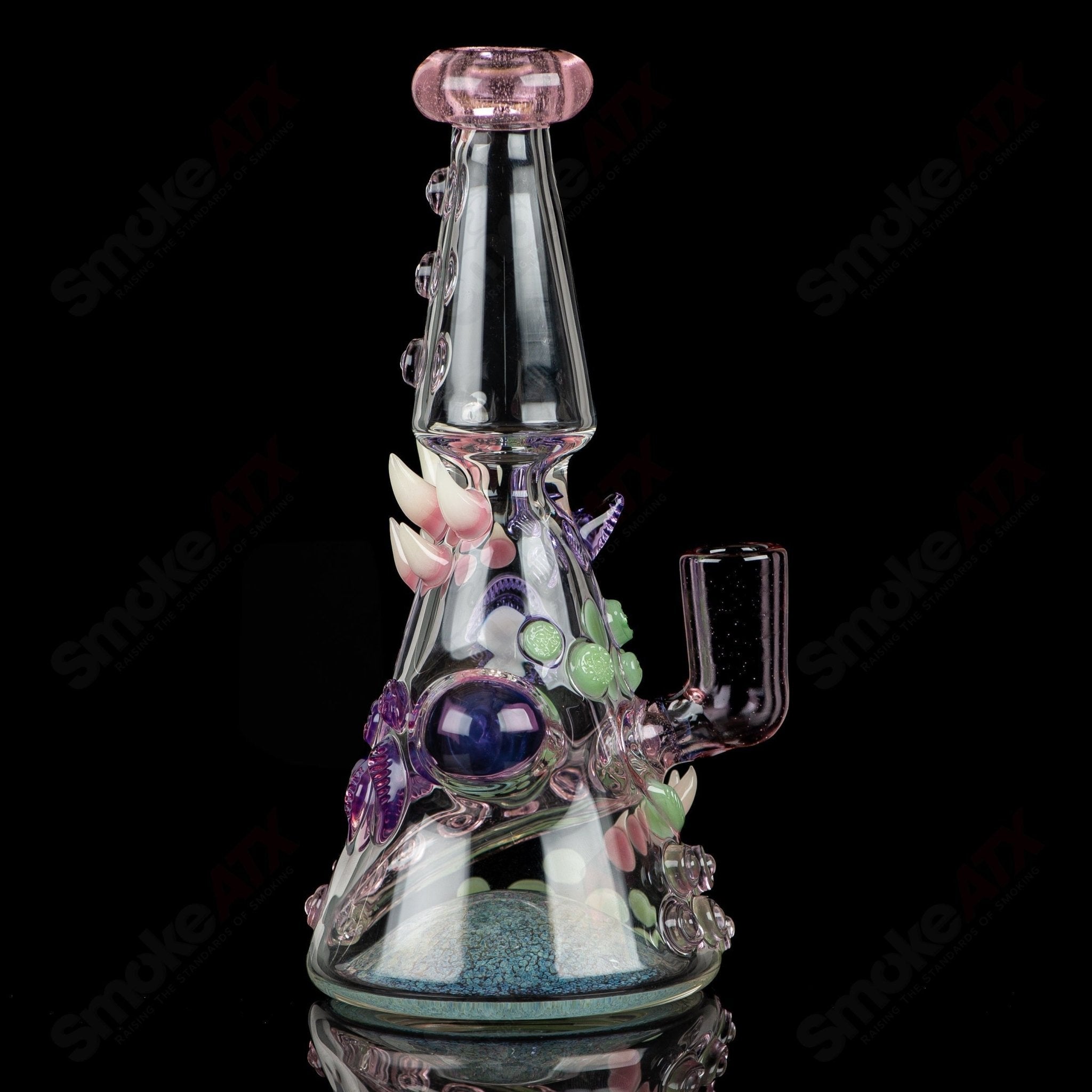 CFL Rip Curl by Helix Salt Glass, a colorful heady glass concentrate rig with rip curl design and intricate glasswork.