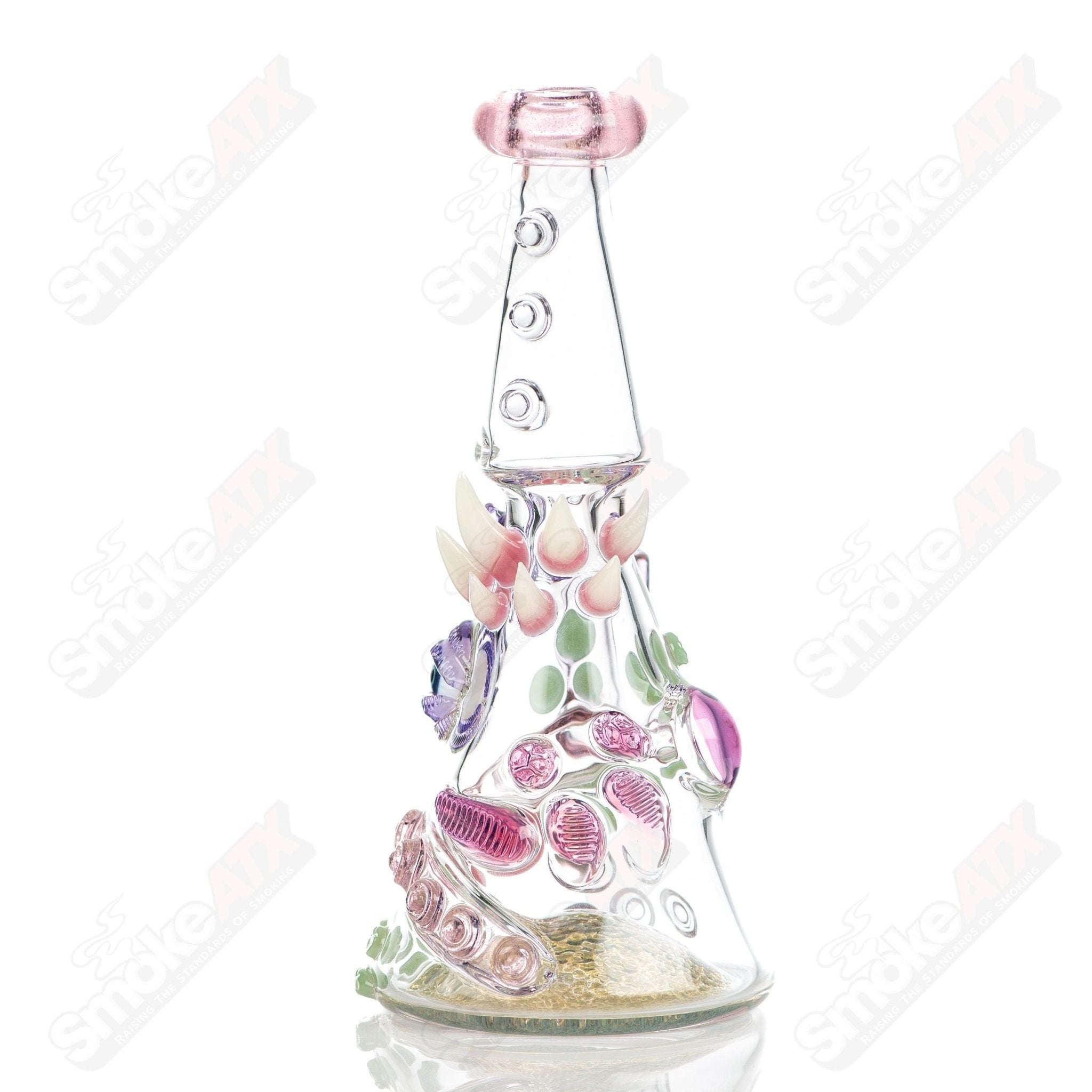 CFL Rip Curl by Helix Salt Glass heady concentrate rig with detailed glass design and vibrant colors.