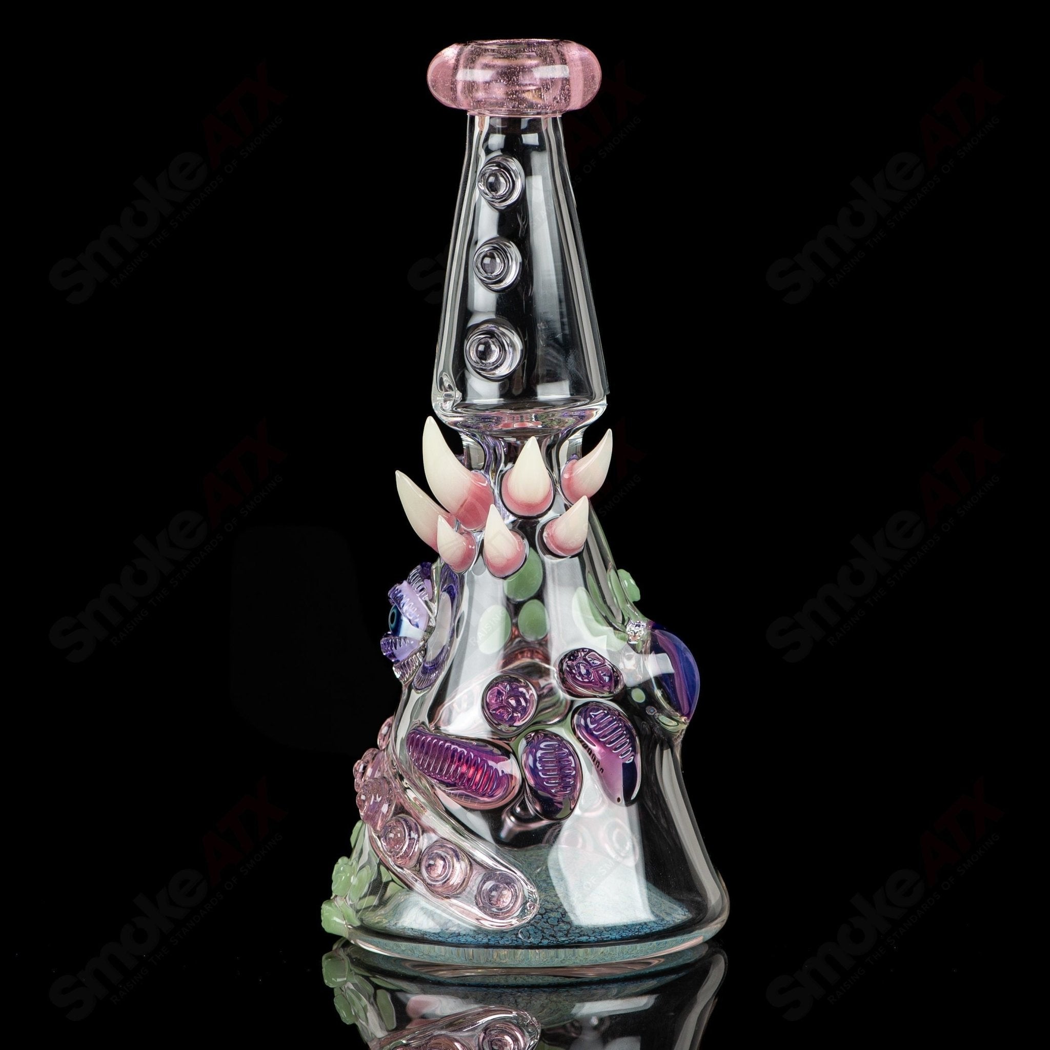 CFL Rip Curl concentrate rig by Salt Glass, Helix & SALT Glass, featuring colorful heady glass design with intricate details