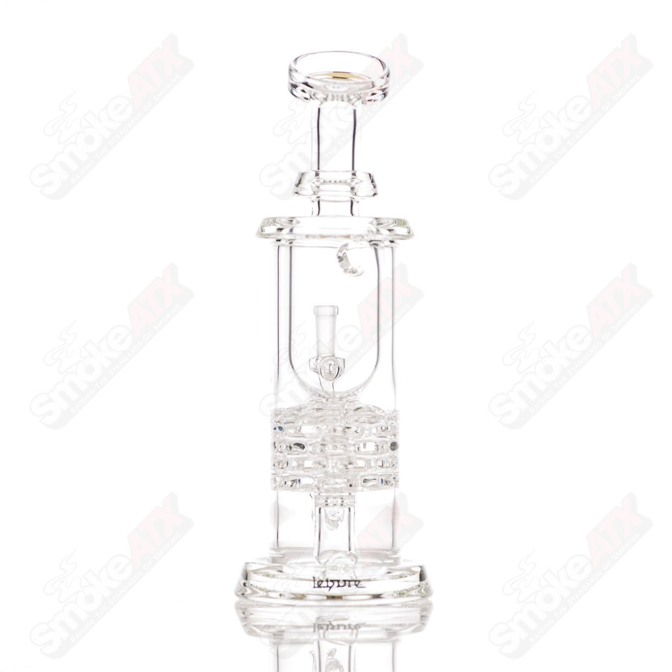 Clear Brickstack Incycler Leisure glass concentrate rig with multiple chambers and intricate design for dabbing enjoyment.
