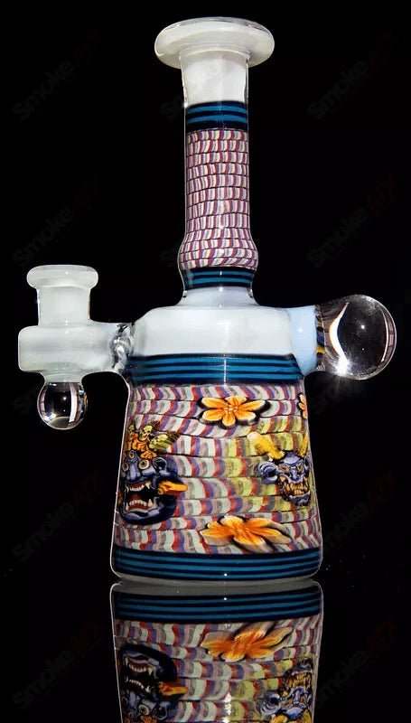 Coiled Latticello Milli Rig Conversion Glass by Conversion Glass, heady concentrate rig with intricate coil design and colorful glass accents.