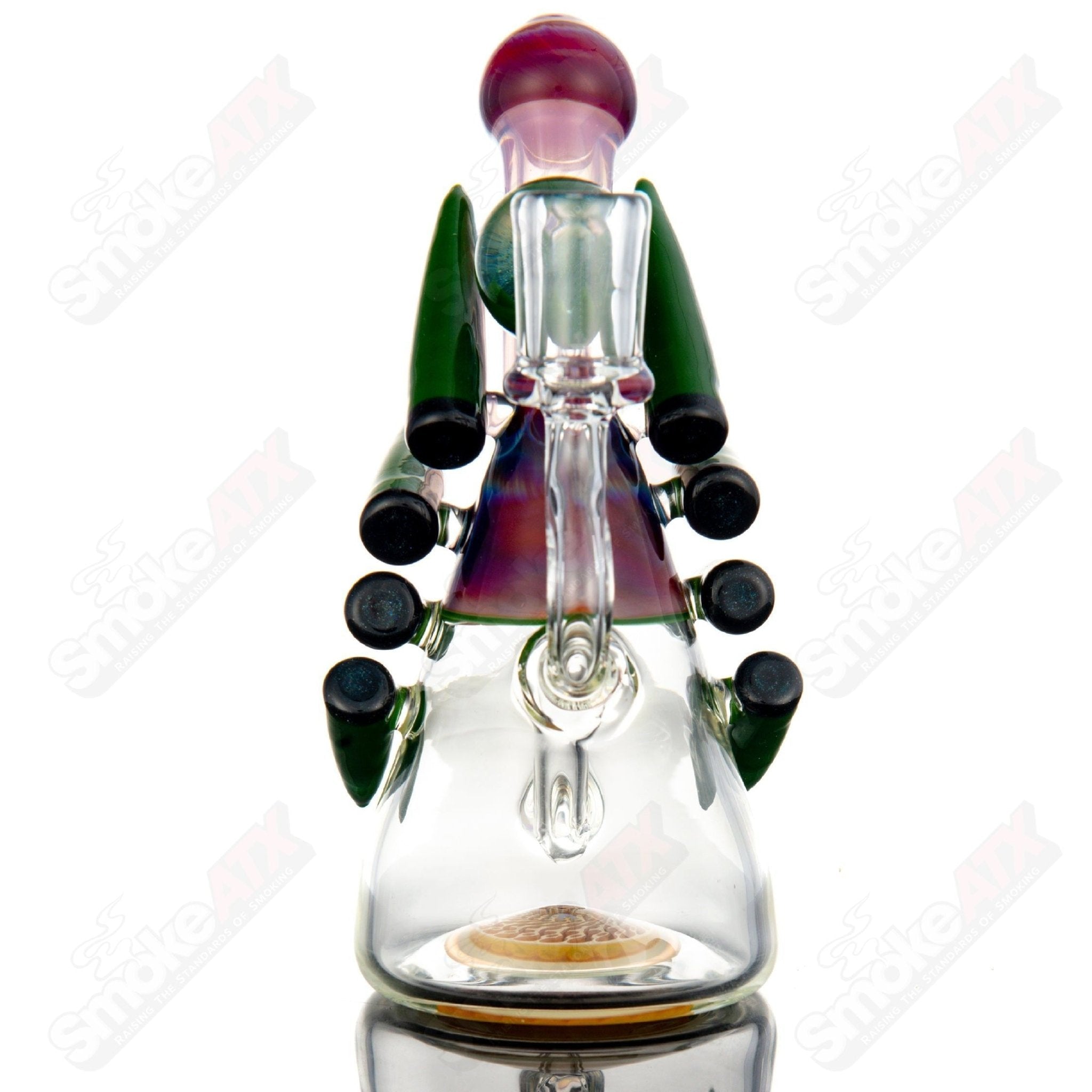 Color accent horned Bub rig by Yunk Glass, a heady glass concentrate rig with vibrant color accents and unique horned design.
