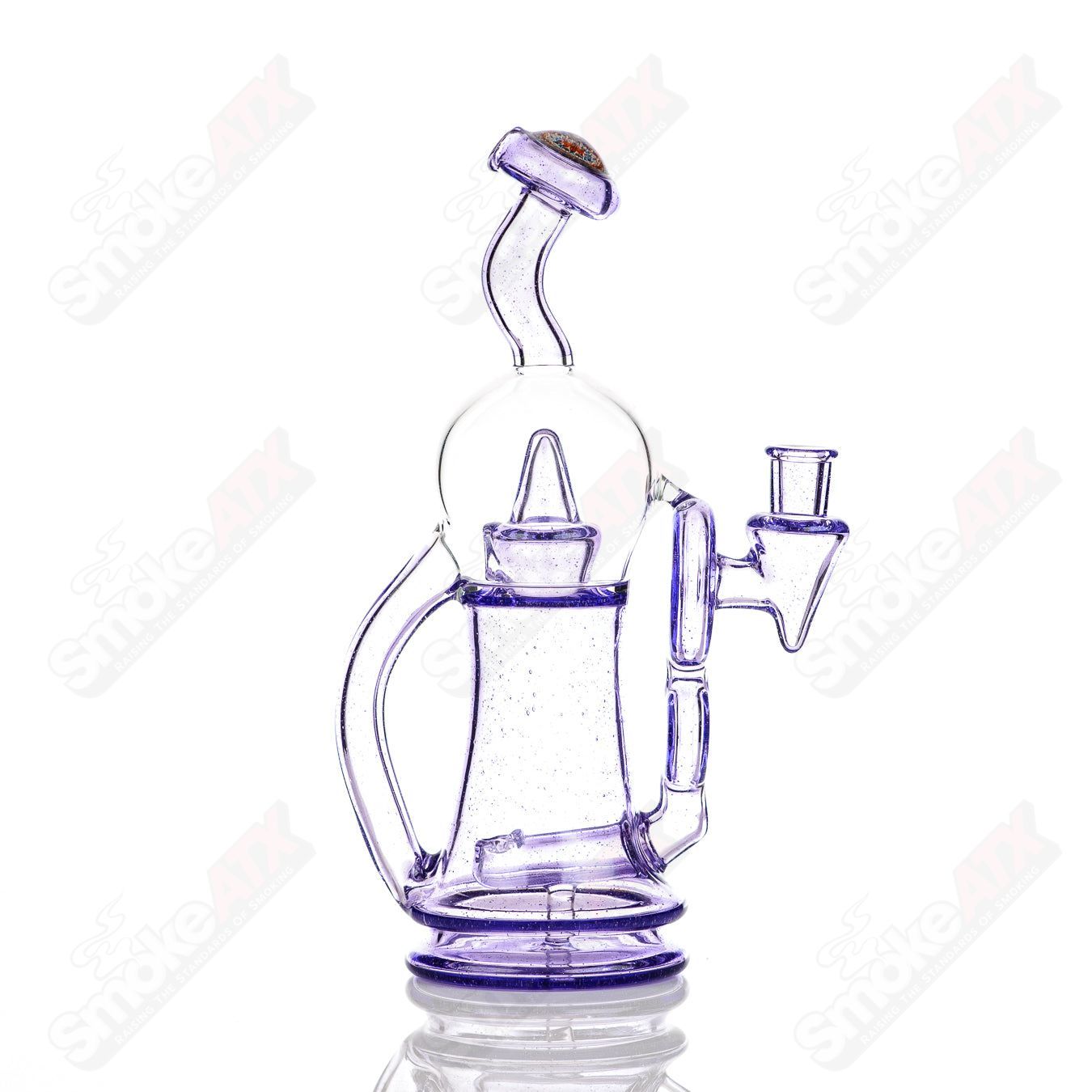 Colored Bubble Dumper Reed Glass concentrate rig with vibrant glass design and intricate bubble patterns, crafted by Reed Glass.