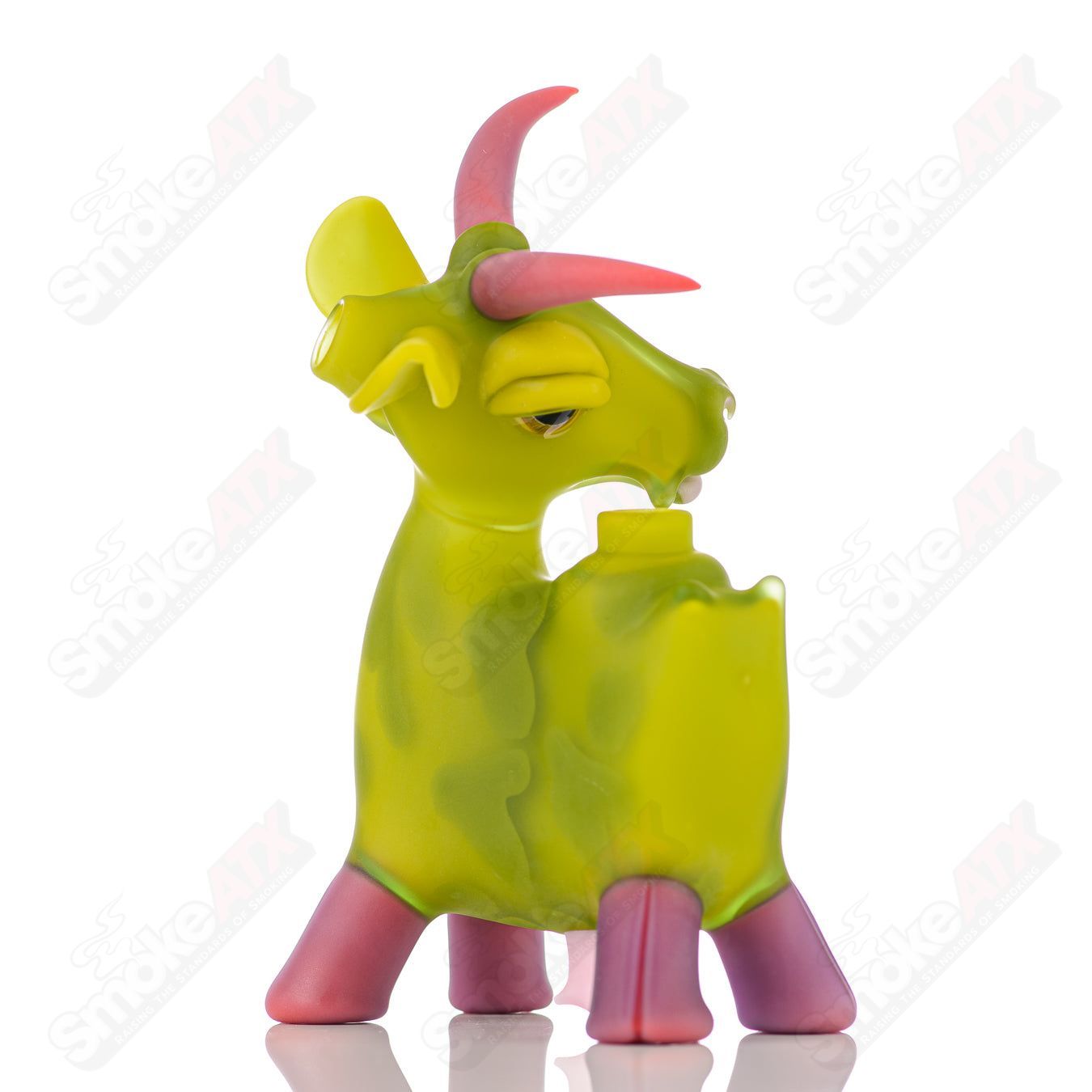Colorful Cow Rig Robertson Glass heady concentrate rig with intricate glass details and a sturdy base for dabbing.
