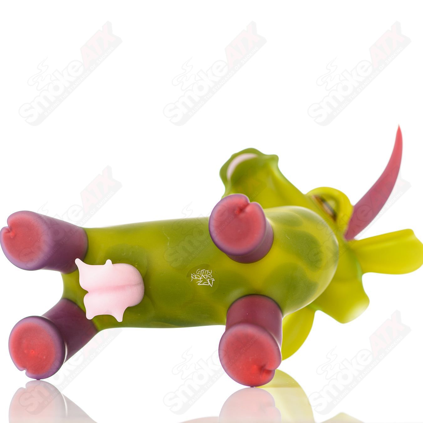 Colorful Cow Rig Robertson Glass heady concentrate rig with intricate glass design and detailed cow motif.