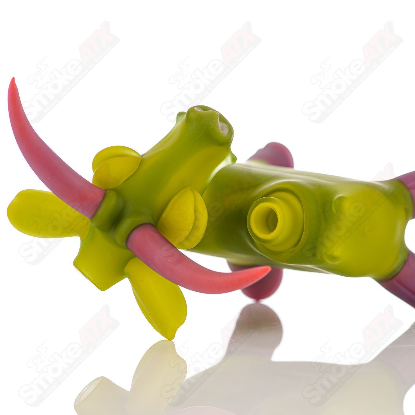 Colorful Cow Rig Robertson Glass concentrate rig with detailed cow design, featuring intricate glasswork and a sturdy base.