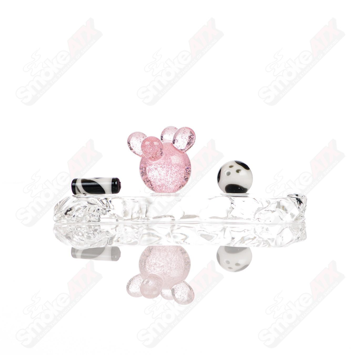 Glass Cow Slurper Set from Adventures In Glass Blowing, featuring colorful glass tools and accessories for artistic glass blowing.