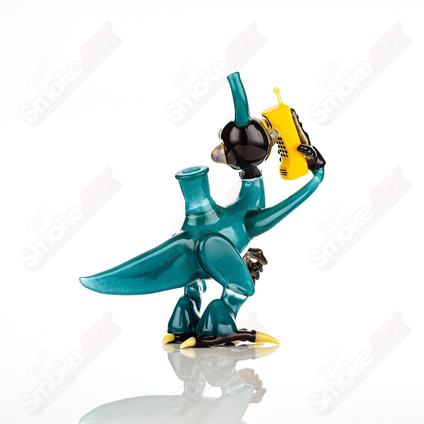 Elbo Glass Coyle x Elbo Dino Monkey heady glass concentrate rig with colorful dinosaur design and detailed craftsmanship.