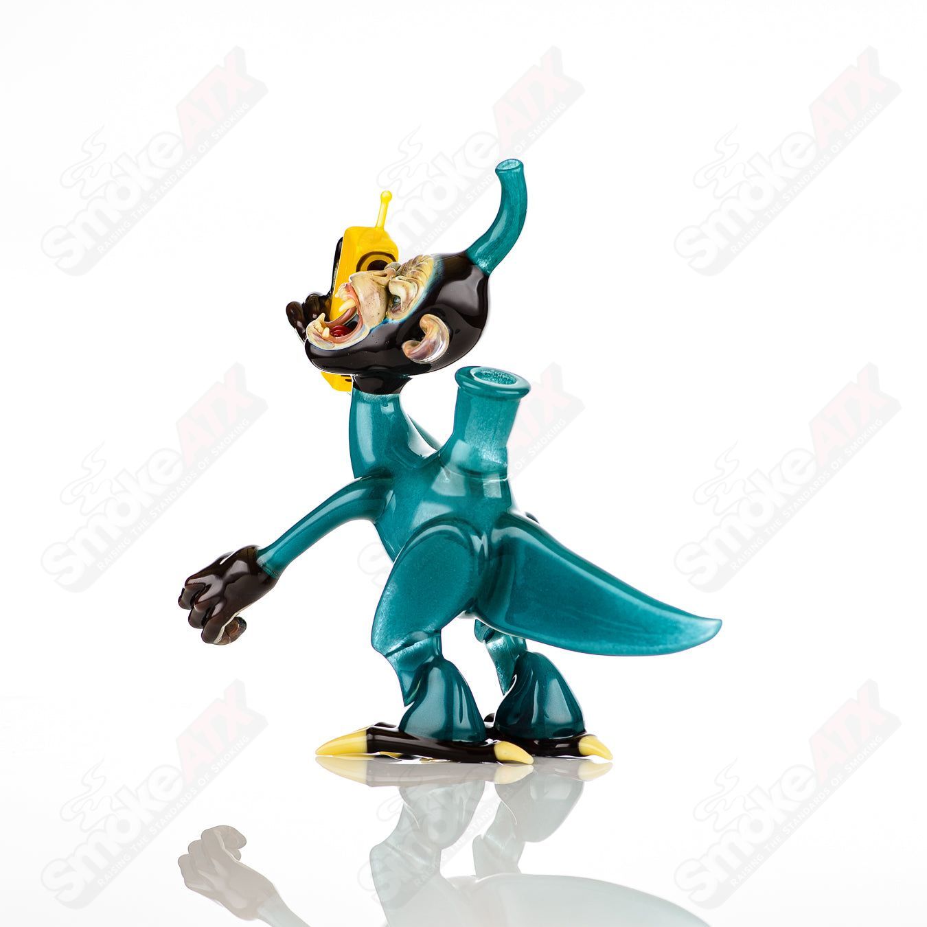 Elbo Glass Coyle x Elbo Dino Monkey heady glass concentrate rig with detailed dinosaur and monkey design.