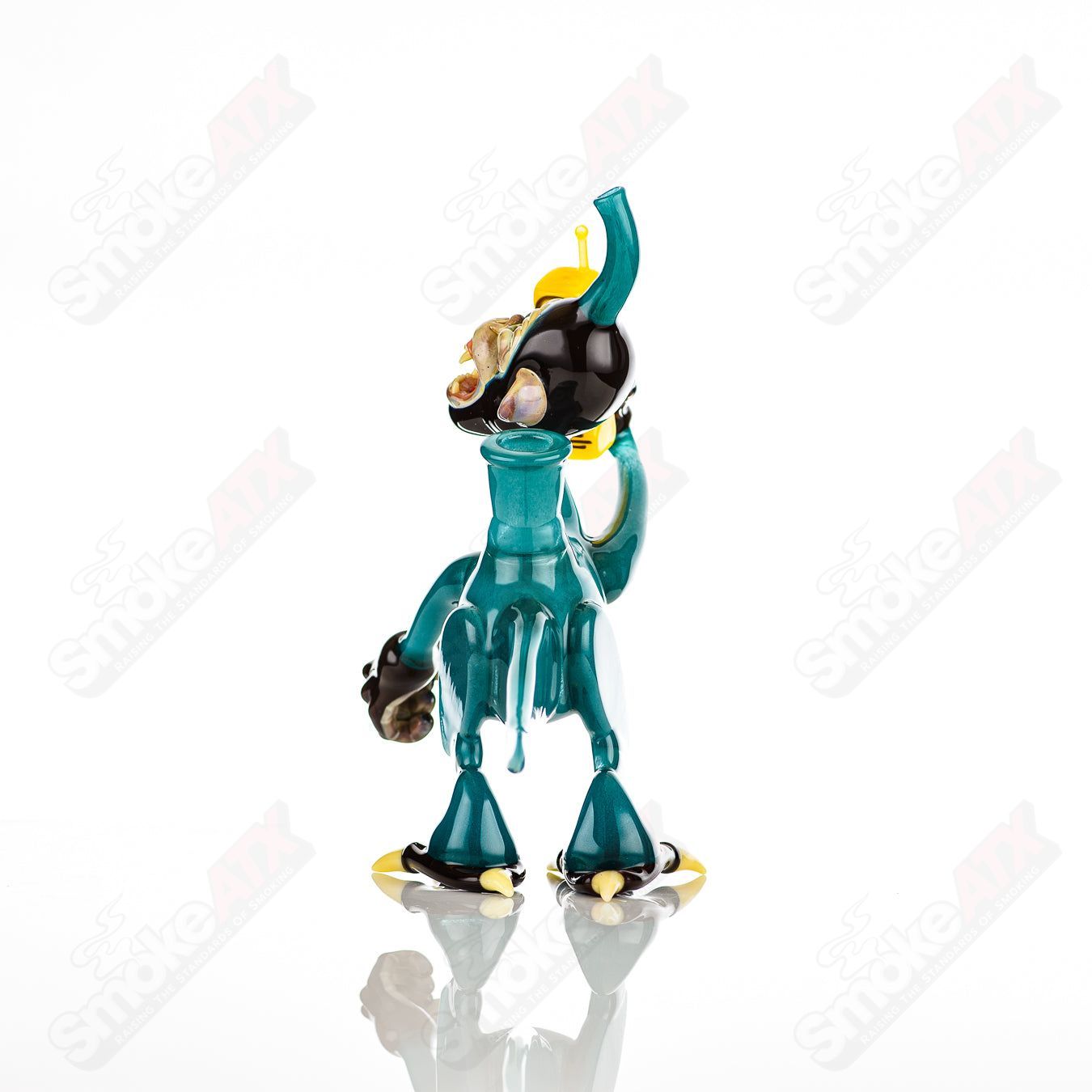 Elbo Glass Coyle x Elbo Dino Monkey heady glass concentrate rig with colorful dinosaur design and intricate glass details.