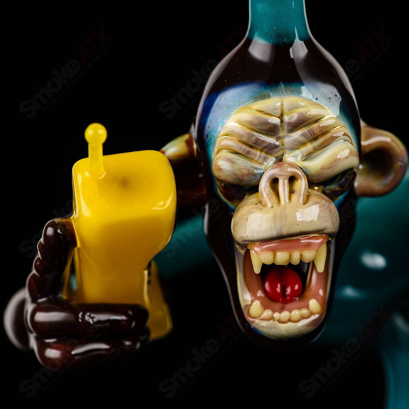 Elbo Glass Coyle x Elbo Dino Monkey heady concentrate rig with intricate design and vibrant colors for dabbing and concentrates.