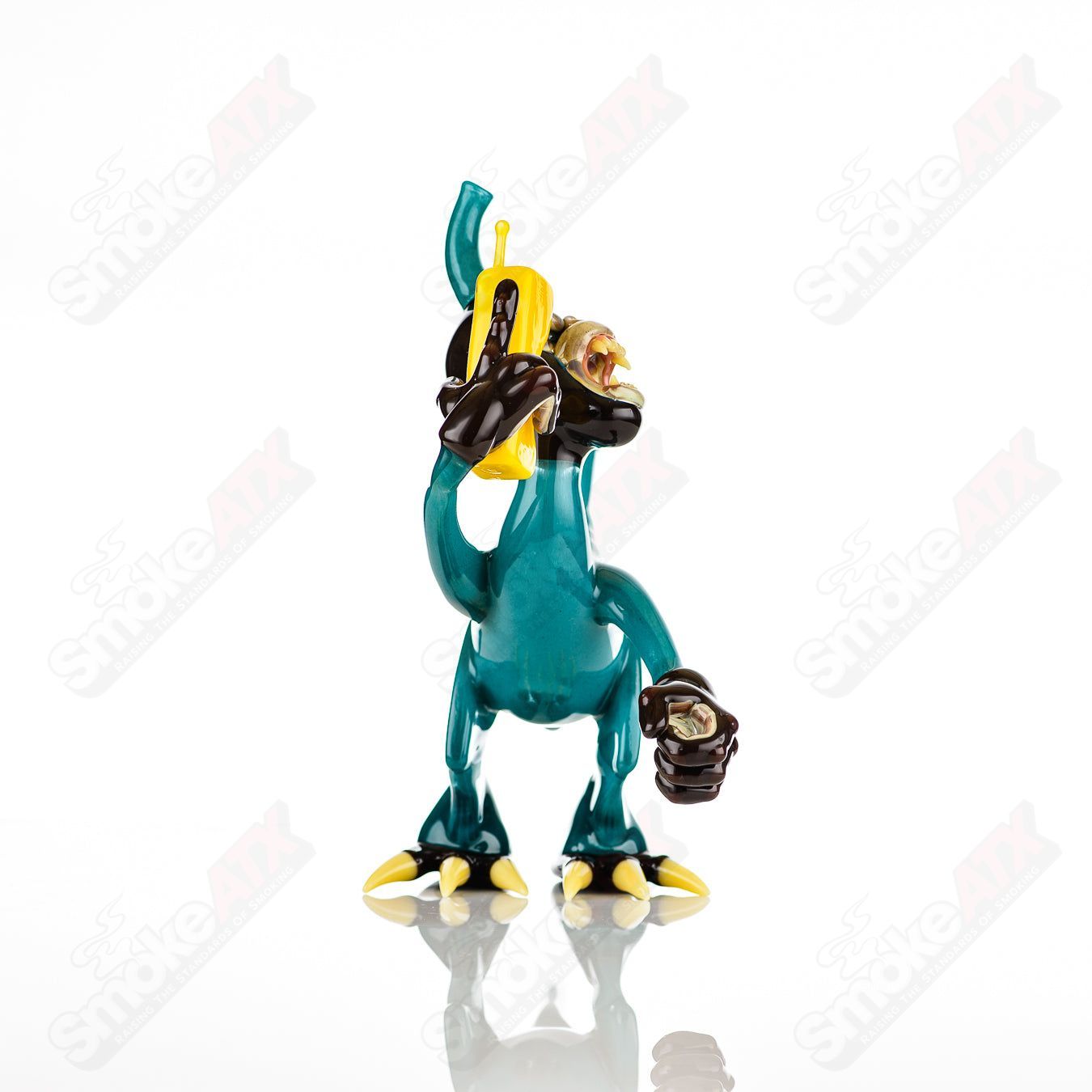 Elbo Glass Coyle x Elbo Dino Monkey heady glass concentrate rig with colorful dinosaur design and intricate glass details.