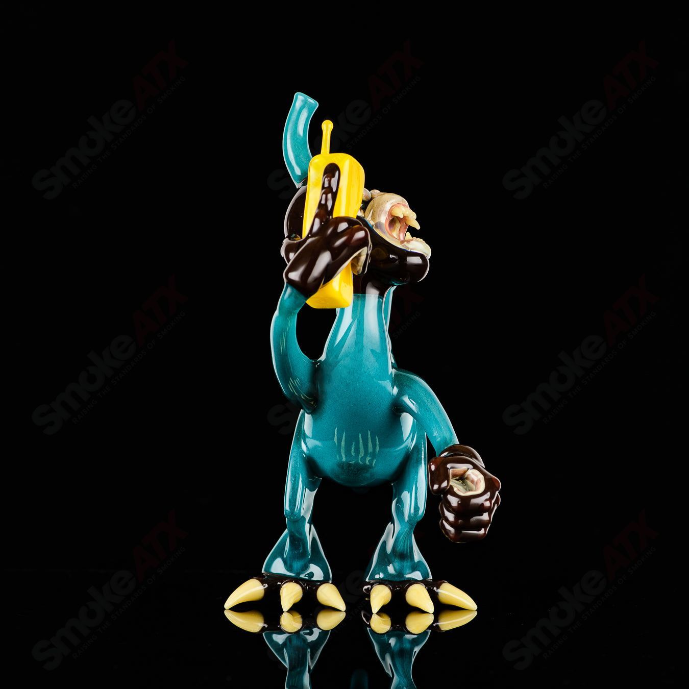 Elbo Glass Coyle x Elbo Dino Monkey heady glass concentrate rig with detailed dinosaur and monkey design.