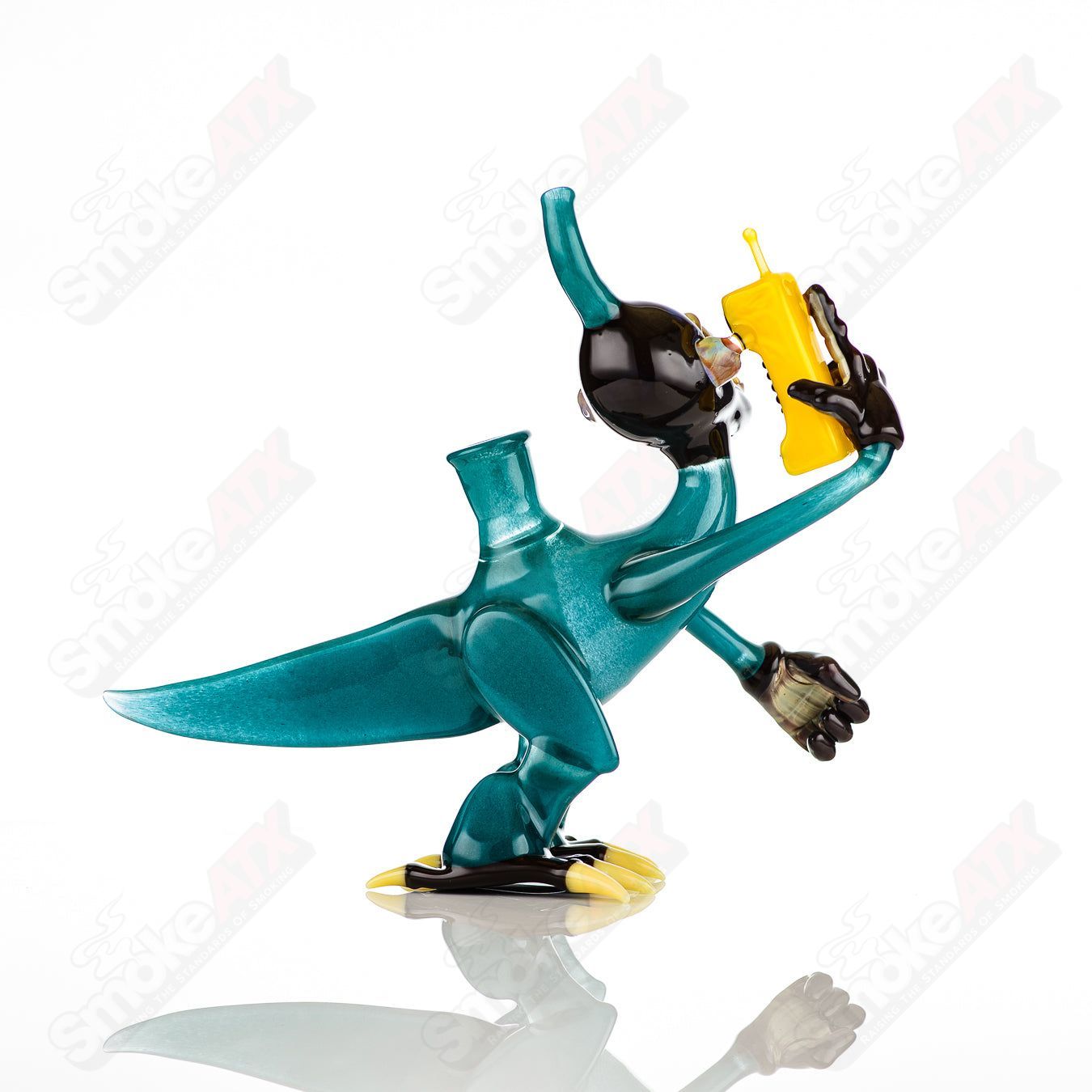 Elbo Glass Coyle x Elbo Dino Monkey heady glass concentrate rig with colorful dinosaur and monkey design, artistic and detailed.